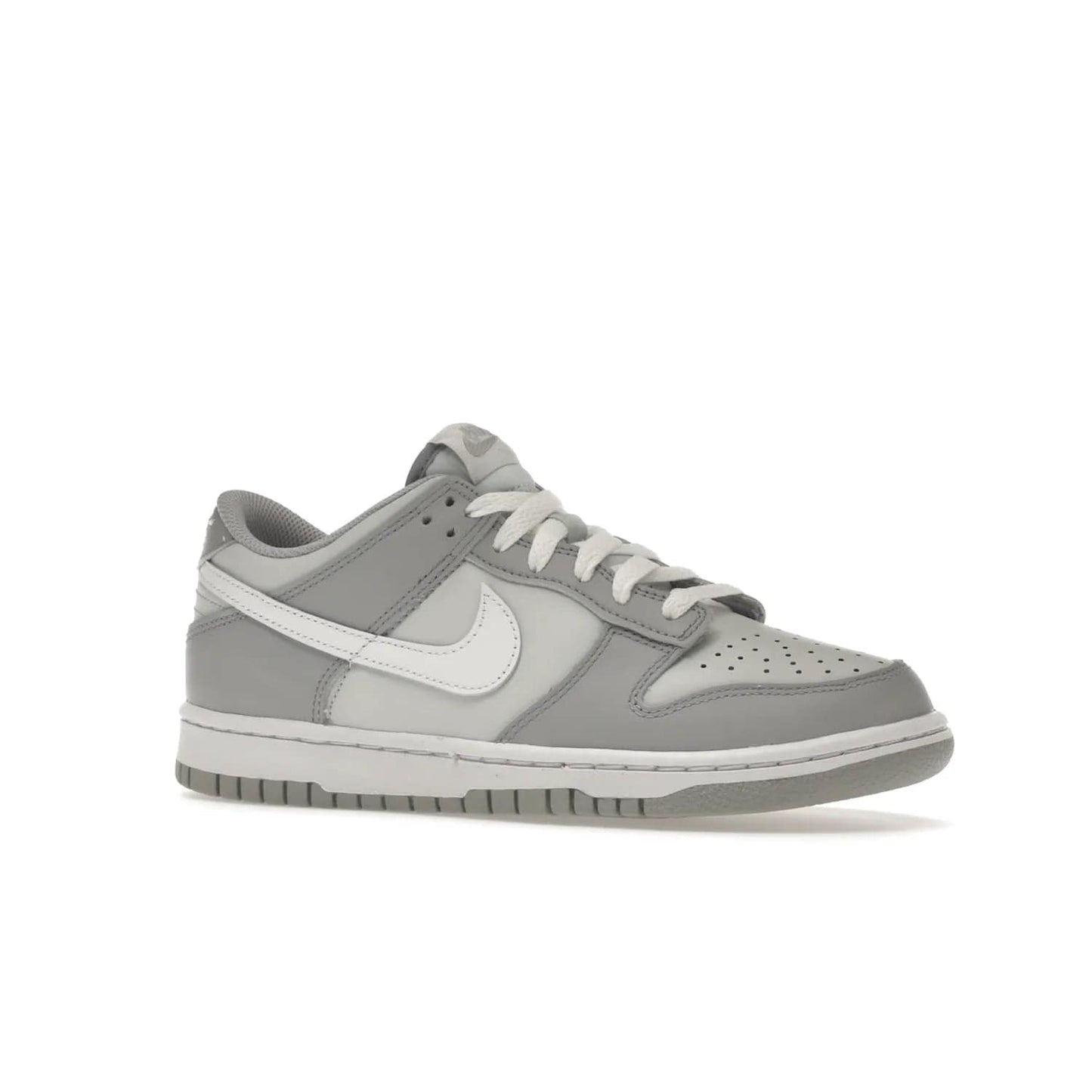 Nike Dunk Low Two-Toned Grey (GS) - Image 4 - Only at www.BallersClubKickz.com - Stylish Nike Dunk Low GS Two-Toned Grey featuring leather build, light/dark grey shades, white Swoosh logo & gray rubber outsole. Get ready to make a statement with this timeless classic released in March 2022.