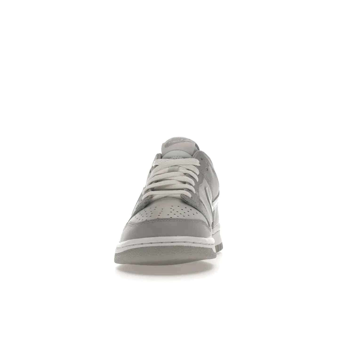 Nike Dunk Low Two-Toned Grey (GS) - Image 11 - Only at www.BallersClubKickz.com - Stylish Nike Dunk Low GS Two-Toned Grey featuring leather build, light/dark grey shades, white Swoosh logo & gray rubber outsole. Get ready to make a statement with this timeless classic released in March 2022.