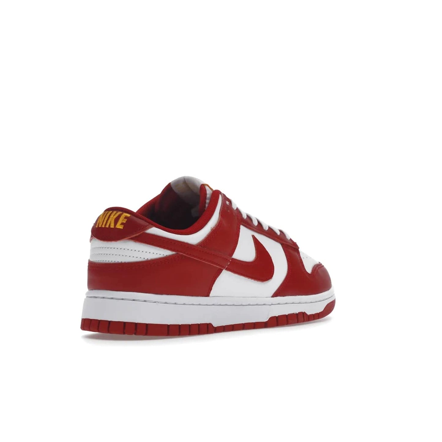 Nike Dunk Low USC - Image 32 - Only at www.BallersClubKickz.com - The Nike Dunk Low USC DD1391-602 colorway captures the eye of University of Southern California fans. Crafted with leather and rubber upper and outsole, this stylish sneaker features a white, gym red, and yellow colorway. With yellow Nike branding, white perforated vamp, and red suede Swoosh, this sneaker turns heads. Get the classic Nike Dunk Low USC releasing on November 9th, 2022.
