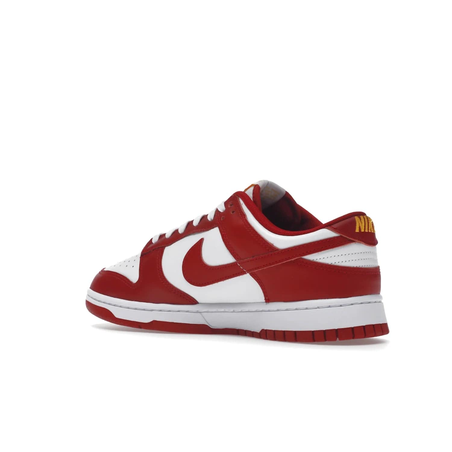 Nike Dunk Low USC - Image 23 - Only at www.BallersClubKickz.com - The Nike Dunk Low USC DD1391-602 colorway captures the eye of University of Southern California fans. Crafted with leather and rubber upper and outsole, this stylish sneaker features a white, gym red, and yellow colorway. With yellow Nike branding, white perforated vamp, and red suede Swoosh, this sneaker turns heads. Get the classic Nike Dunk Low USC releasing on November 9th, 2022.