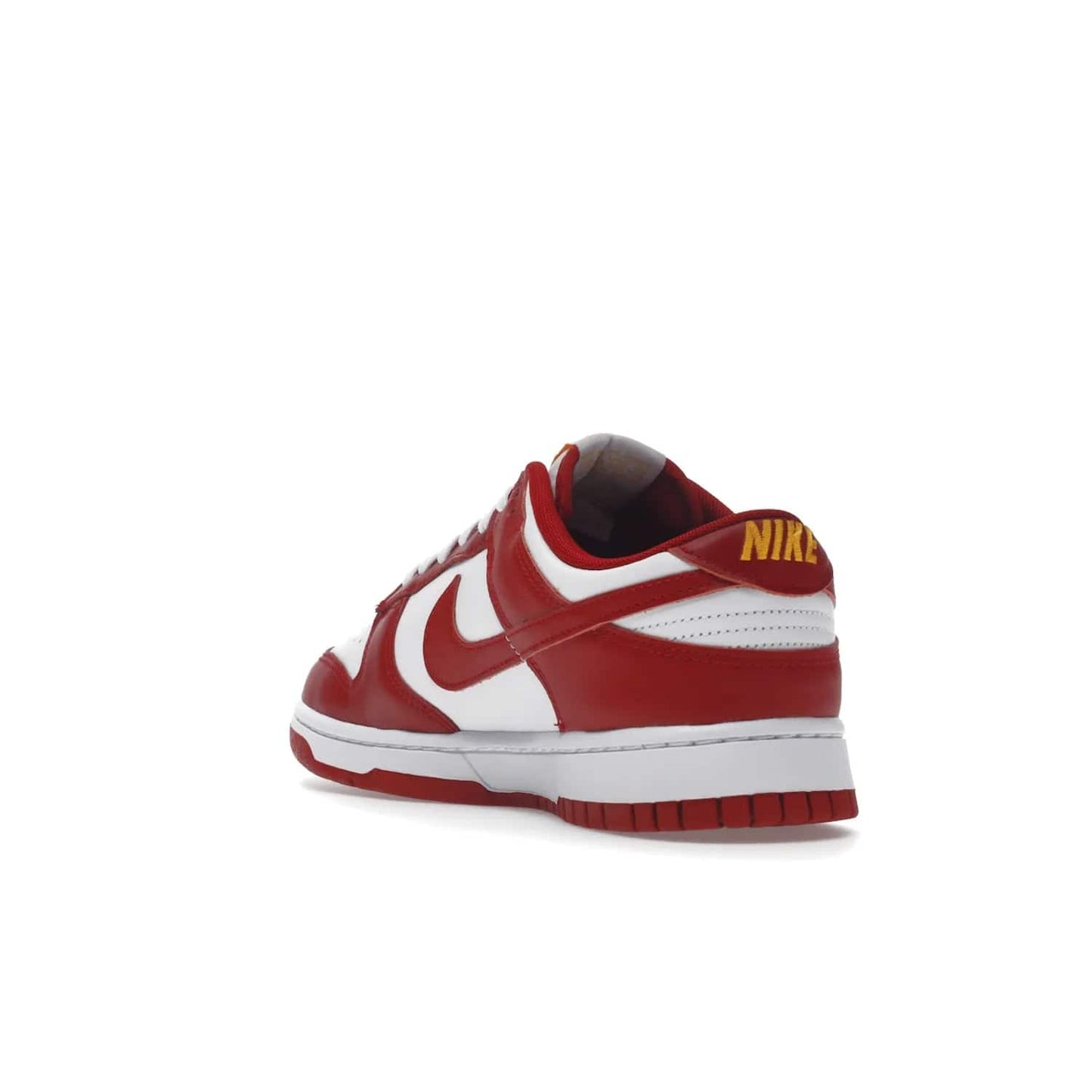 Nike Dunk Low USC - Image 25 - Only at www.BallersClubKickz.com - The Nike Dunk Low USC DD1391-602 colorway captures the eye of University of Southern California fans. Crafted with leather and rubber upper and outsole, this stylish sneaker features a white, gym red, and yellow colorway. With yellow Nike branding, white perforated vamp, and red suede Swoosh, this sneaker turns heads. Get the classic Nike Dunk Low USC releasing on November 9th, 2022.