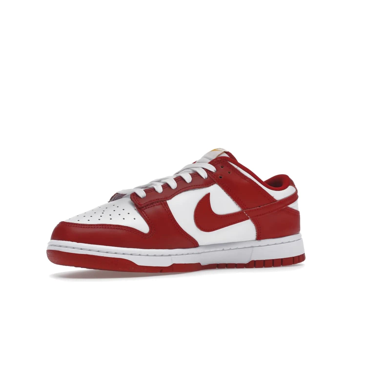 Nike Dunk Low USC - Image 16 - Only at www.BallersClubKickz.com - The Nike Dunk Low USC DD1391-602 colorway captures the eye of University of Southern California fans. Crafted with leather and rubber upper and outsole, this stylish sneaker features a white, gym red, and yellow colorway. With yellow Nike branding, white perforated vamp, and red suede Swoosh, this sneaker turns heads. Get the classic Nike Dunk Low USC releasing on November 9th, 2022.