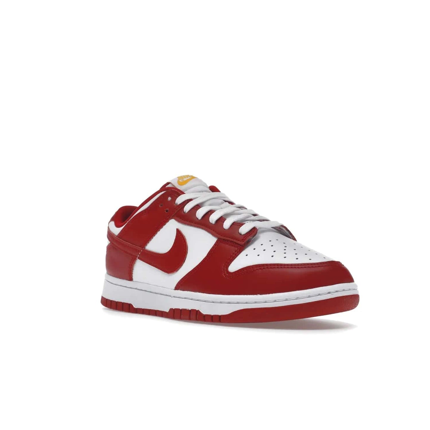 Nike Dunk Low USC - Image 6 - Only at www.BallersClubKickz.com - The Nike Dunk Low USC DD1391-602 colorway captures the eye of University of Southern California fans. Crafted with leather and rubber upper and outsole, this stylish sneaker features a white, gym red, and yellow colorway. With yellow Nike branding, white perforated vamp, and red suede Swoosh, this sneaker turns heads. Get the classic Nike Dunk Low USC releasing on November 9th, 2022.
