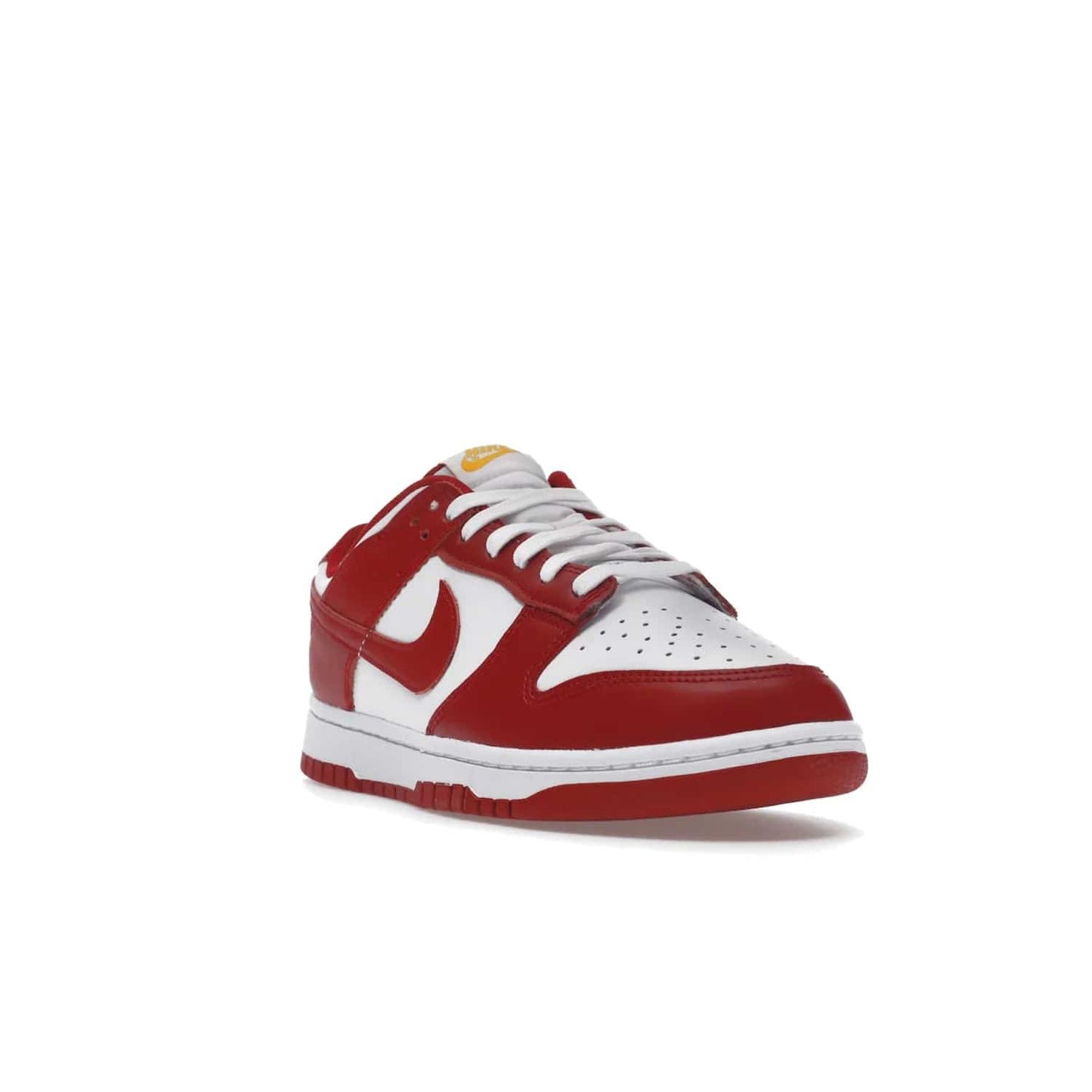 Nike Dunk Low USC - Image 7 - Only at www.BallersClubKickz.com - The Nike Dunk Low USC DD1391-602 colorway captures the eye of University of Southern California fans. Crafted with leather and rubber upper and outsole, this stylish sneaker features a white, gym red, and yellow colorway. With yellow Nike branding, white perforated vamp, and red suede Swoosh, this sneaker turns heads. Get the classic Nike Dunk Low USC releasing on November 9th, 2022.