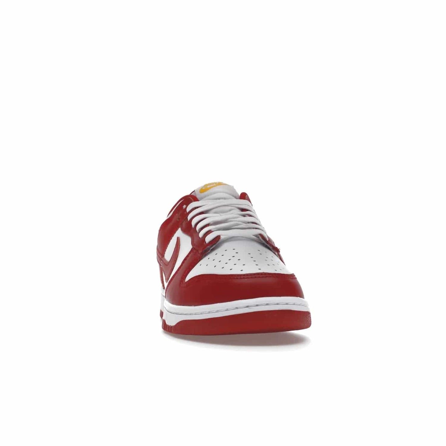 Nike Dunk Low USC - Image 9 - Only at www.BallersClubKickz.com - The Nike Dunk Low USC DD1391-602 colorway captures the eye of University of Southern California fans. Crafted with leather and rubber upper and outsole, this stylish sneaker features a white, gym red, and yellow colorway. With yellow Nike branding, white perforated vamp, and red suede Swoosh, this sneaker turns heads. Get the classic Nike Dunk Low USC releasing on November 9th, 2022.