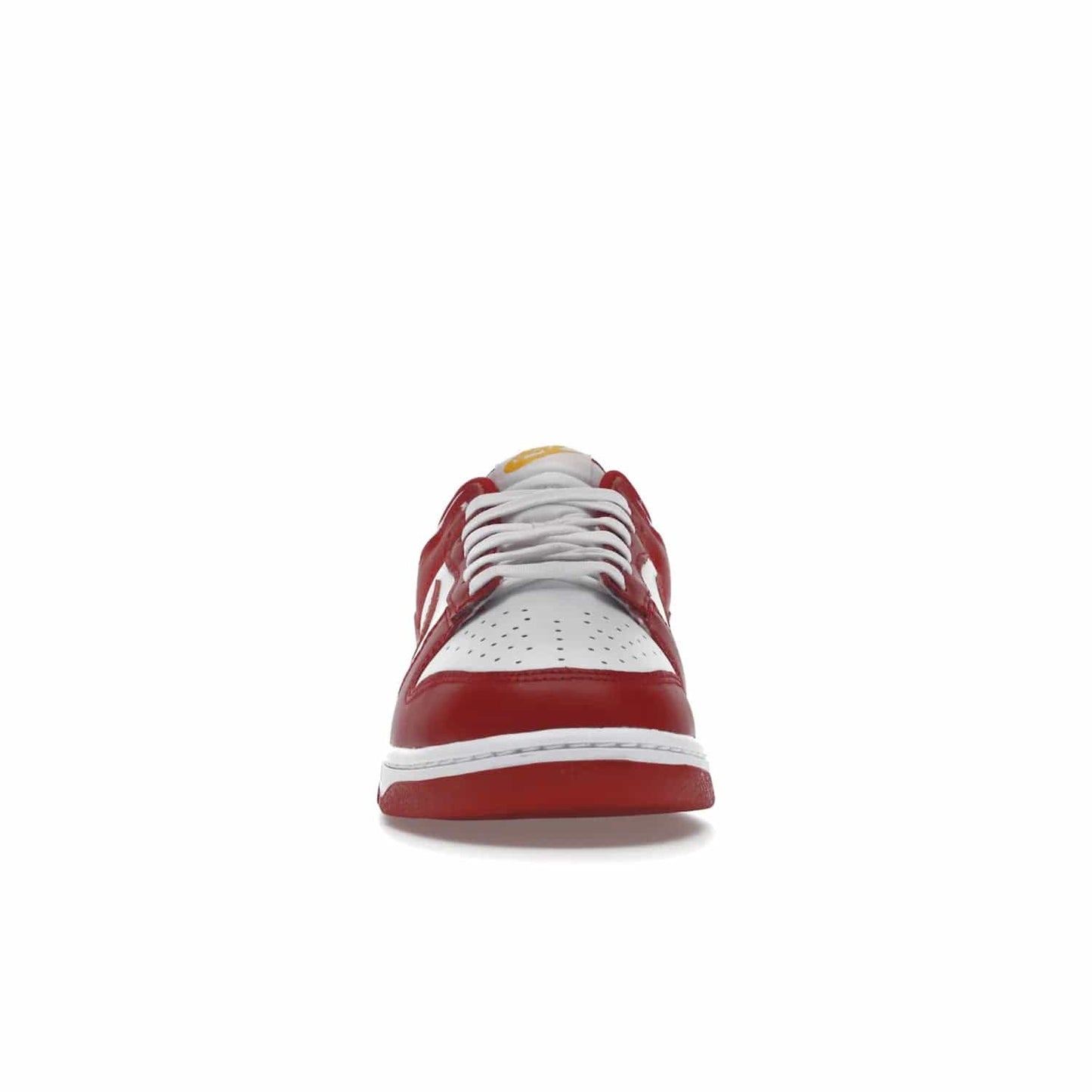 Nike Dunk Low USC - Image 10 - Only at www.BallersClubKickz.com - The Nike Dunk Low USC DD1391-602 colorway captures the eye of University of Southern California fans. Crafted with leather and rubber upper and outsole, this stylish sneaker features a white, gym red, and yellow colorway. With yellow Nike branding, white perforated vamp, and red suede Swoosh, this sneaker turns heads. Get the classic Nike Dunk Low USC releasing on November 9th, 2022.