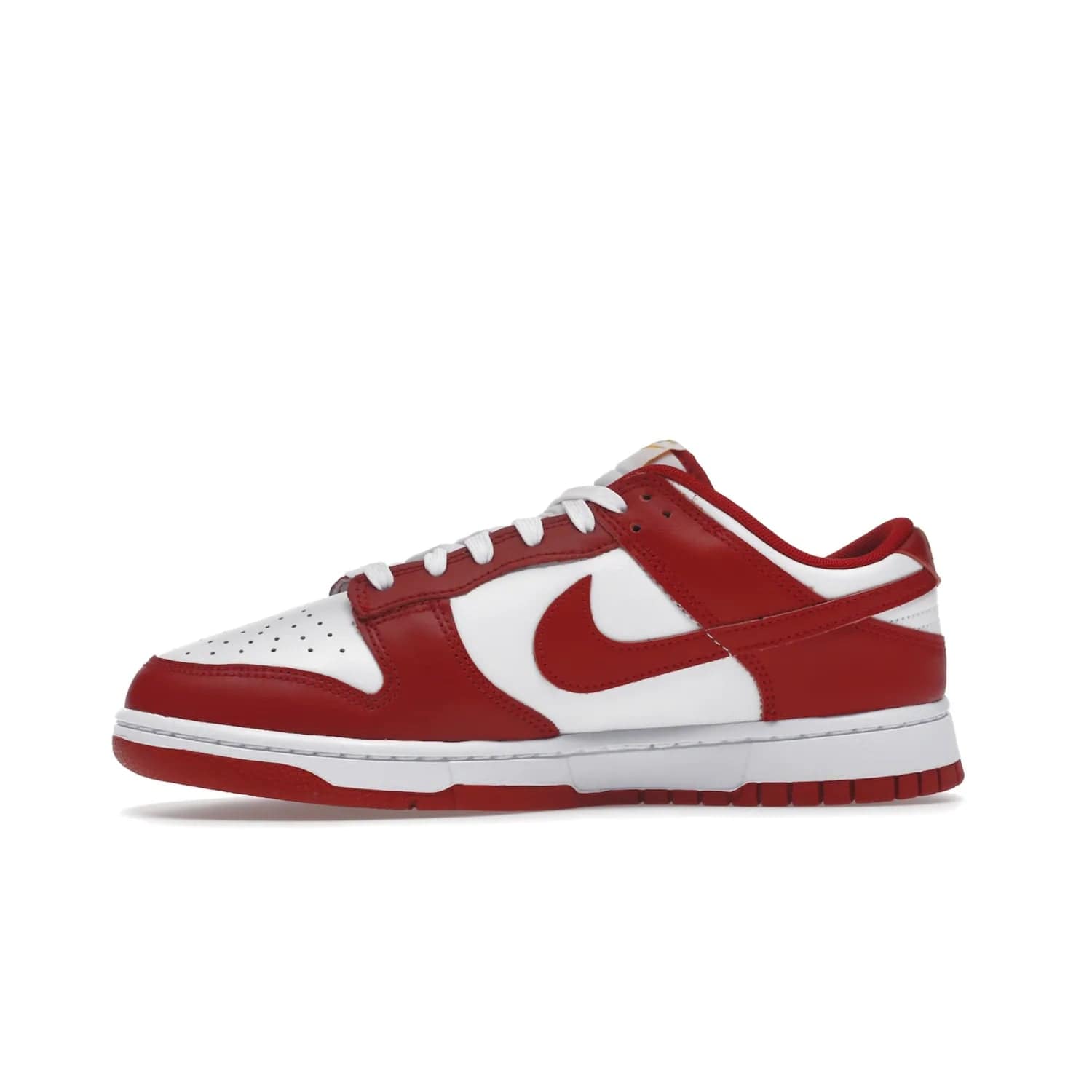 Nike Dunk Low USC - Image 18 - Only at www.BallersClubKickz.com - The Nike Dunk Low USC DD1391-602 colorway captures the eye of University of Southern California fans. Crafted with leather and rubber upper and outsole, this stylish sneaker features a white, gym red, and yellow colorway. With yellow Nike branding, white perforated vamp, and red suede Swoosh, this sneaker turns heads. Get the classic Nike Dunk Low USC releasing on November 9th, 2022.