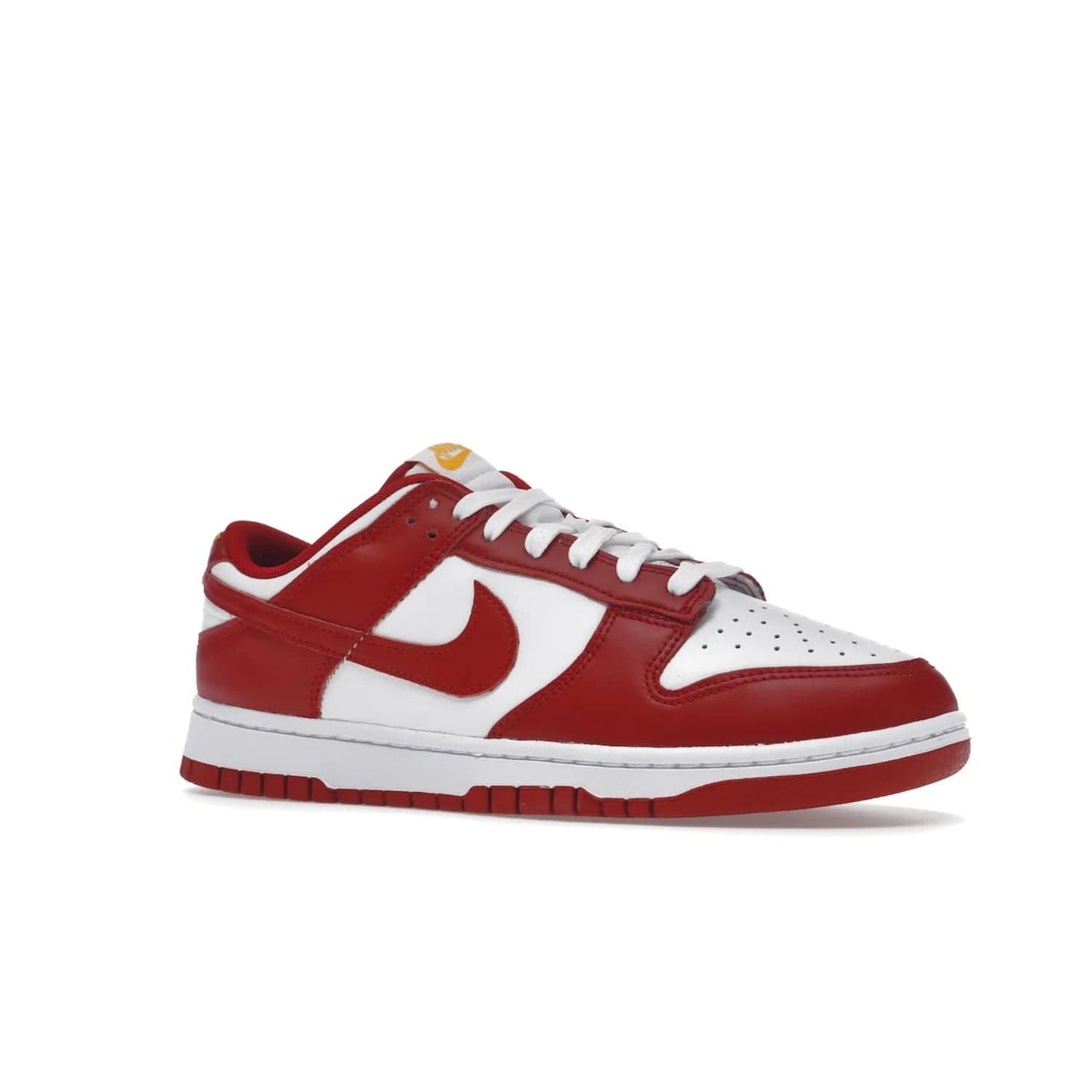 Nike Dunk Low USC - Image 4 - Only at www.BallersClubKickz.com - The Nike Dunk Low USC DD1391-602 colorway captures the eye of University of Southern California fans. Crafted with leather and rubber upper and outsole, this stylish sneaker features a white, gym red, and yellow colorway. With yellow Nike branding, white perforated vamp, and red suede Swoosh, this sneaker turns heads. Get the classic Nike Dunk Low USC releasing on November 9th, 2022.
