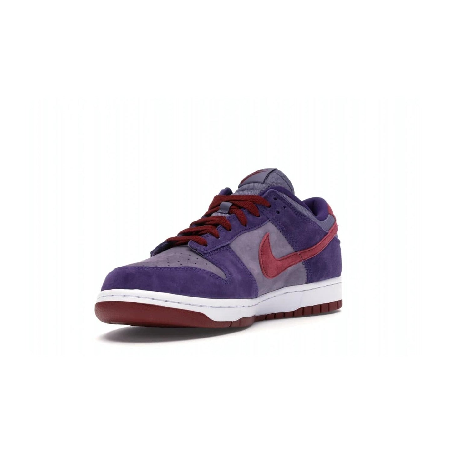Nike Dunk Low Plum (2020) - Image 14 - Only at www.BallersClubKickz.com - Elevate your look with the Nike Dunk Low Plum (2020). Featuring a bold purple colorway, this retro-inspired silhouette is constructed of premium suede and makes for a must-have for any sneakerhead.