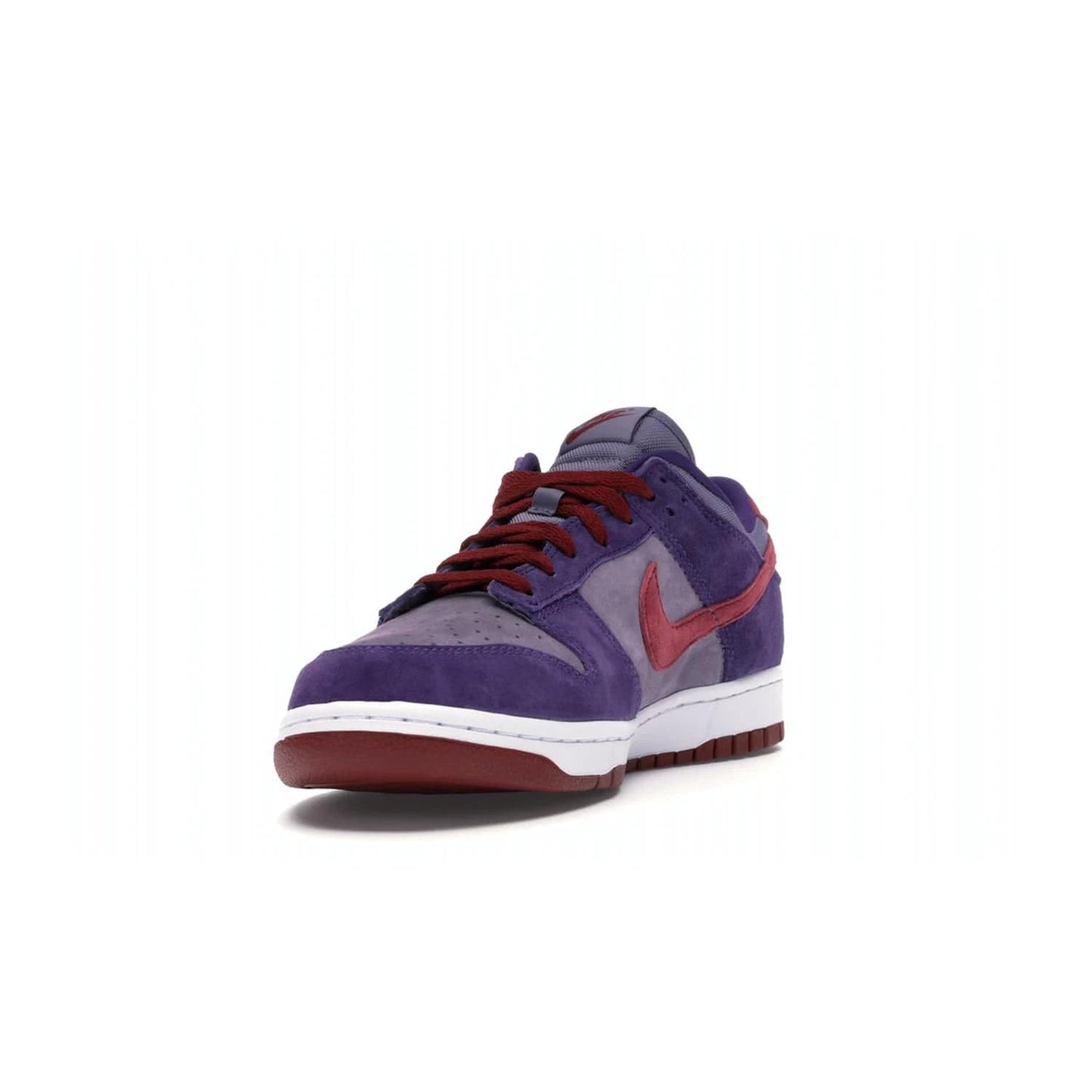 Nike Dunk Low Plum (2020) - Image 13 - Only at www.BallersClubKickz.com - Elevate your look with the Nike Dunk Low Plum (2020). Featuring a bold purple colorway, this retro-inspired silhouette is constructed of premium suede and makes for a must-have for any sneakerhead.