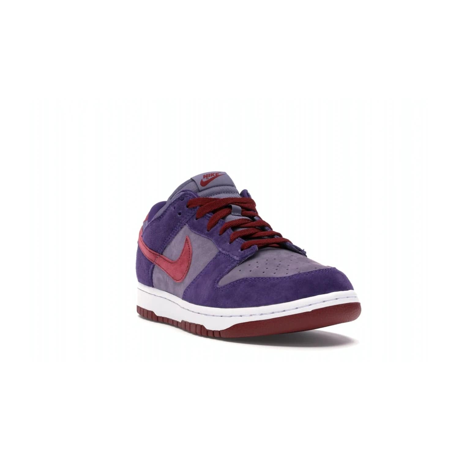 Nike Dunk Low Plum (2020) - Image 7 - Only at www.BallersClubKickz.com - Elevate your look with the Nike Dunk Low Plum (2020). Featuring a bold purple colorway, this retro-inspired silhouette is constructed of premium suede and makes for a must-have for any sneakerhead.