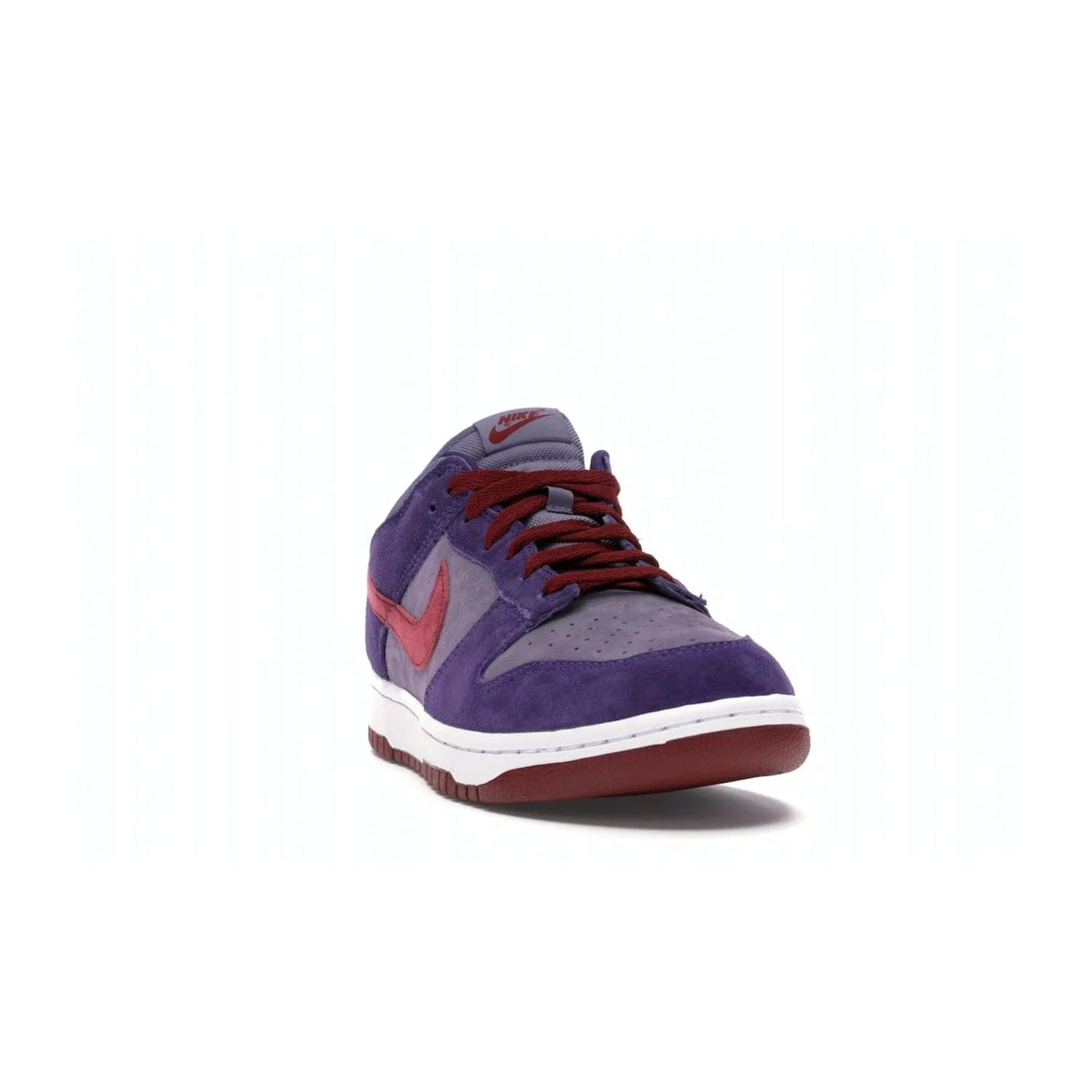 Nike Dunk Low Plum (2020) - Image 8 - Only at www.BallersClubKickz.com - Elevate your look with the Nike Dunk Low Plum (2020). Featuring a bold purple colorway, this retro-inspired silhouette is constructed of premium suede and makes for a must-have for any sneakerhead.