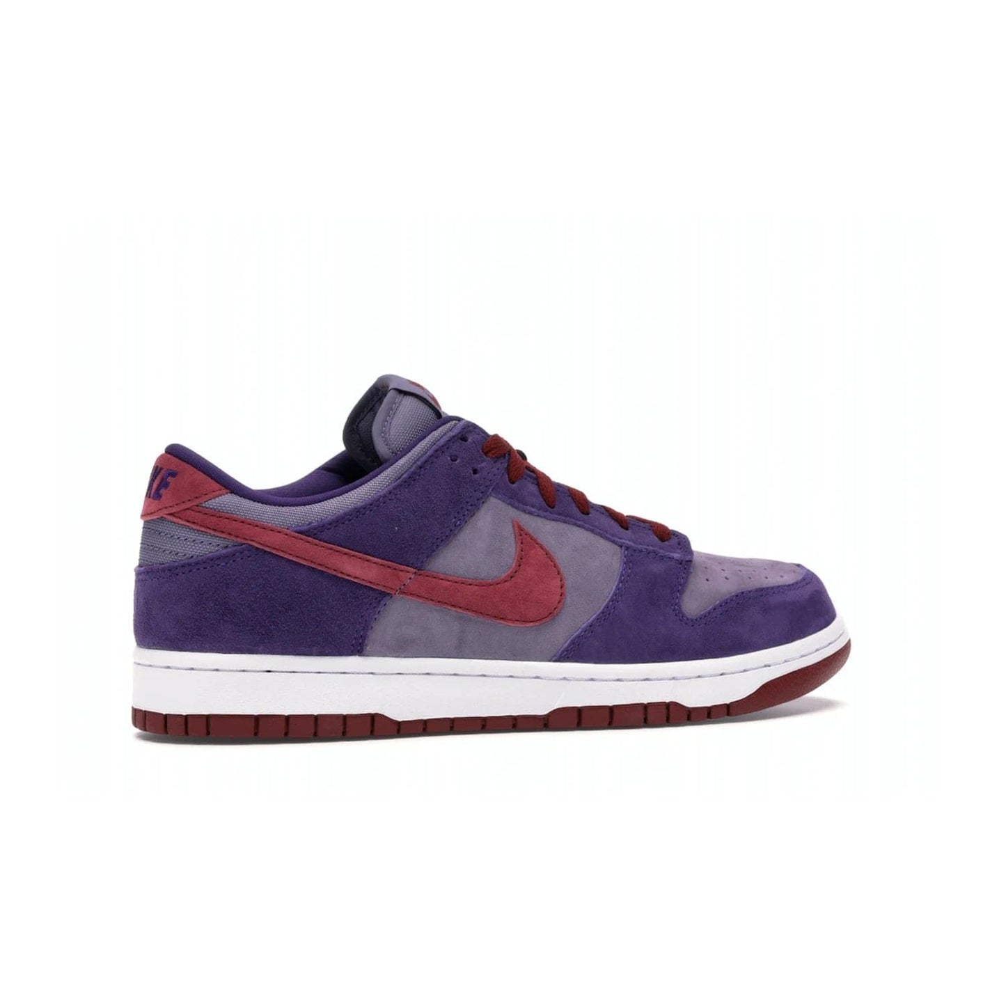Nike Dunk Low Plum (2020) - Image 35 - Only at www.BallersClubKickz.com - Elevate your look with the Nike Dunk Low Plum (2020). Featuring a bold purple colorway, this retro-inspired silhouette is constructed of premium suede and makes for a must-have for any sneakerhead.