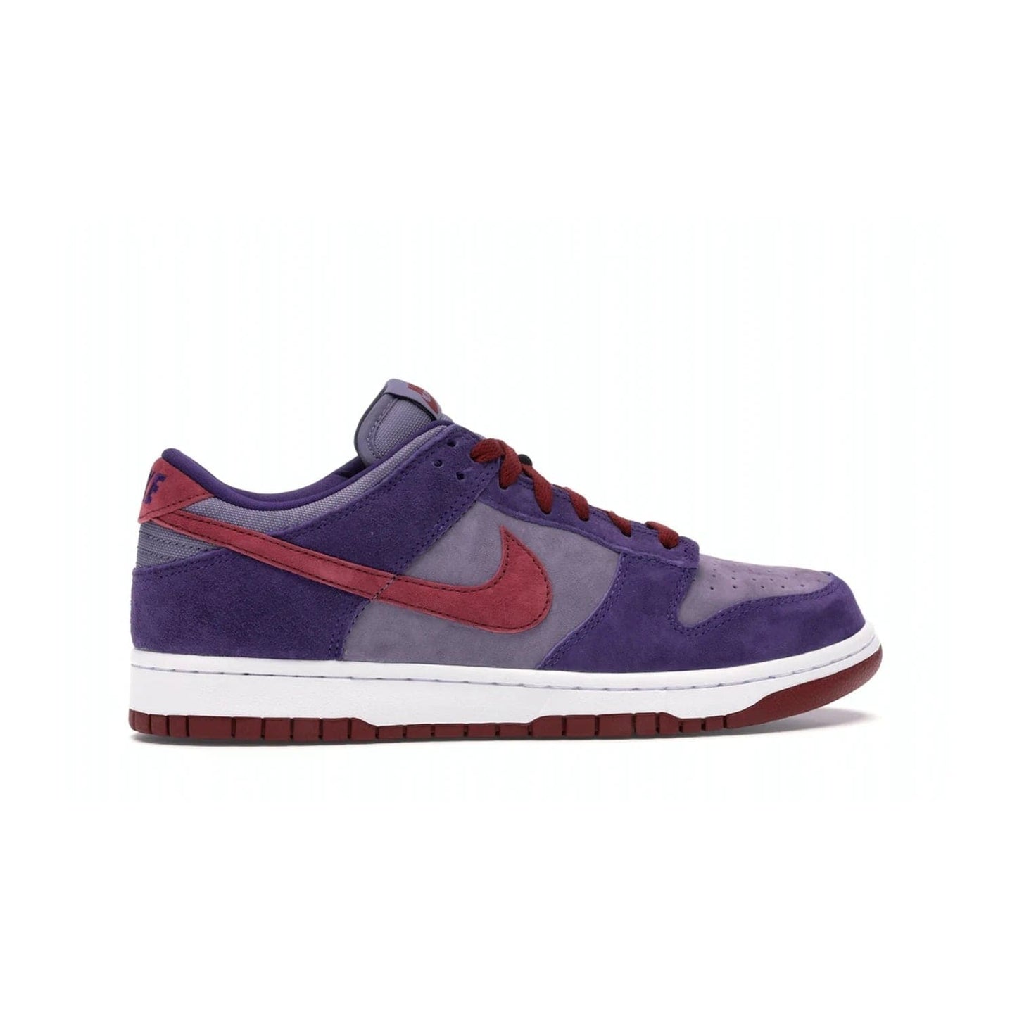 Nike Dunk Low Plum (2020) - Image 36 - Only at www.BallersClubKickz.com - Elevate your look with the Nike Dunk Low Plum (2020). Featuring a bold purple colorway, this retro-inspired silhouette is constructed of premium suede and makes for a must-have for any sneakerhead.