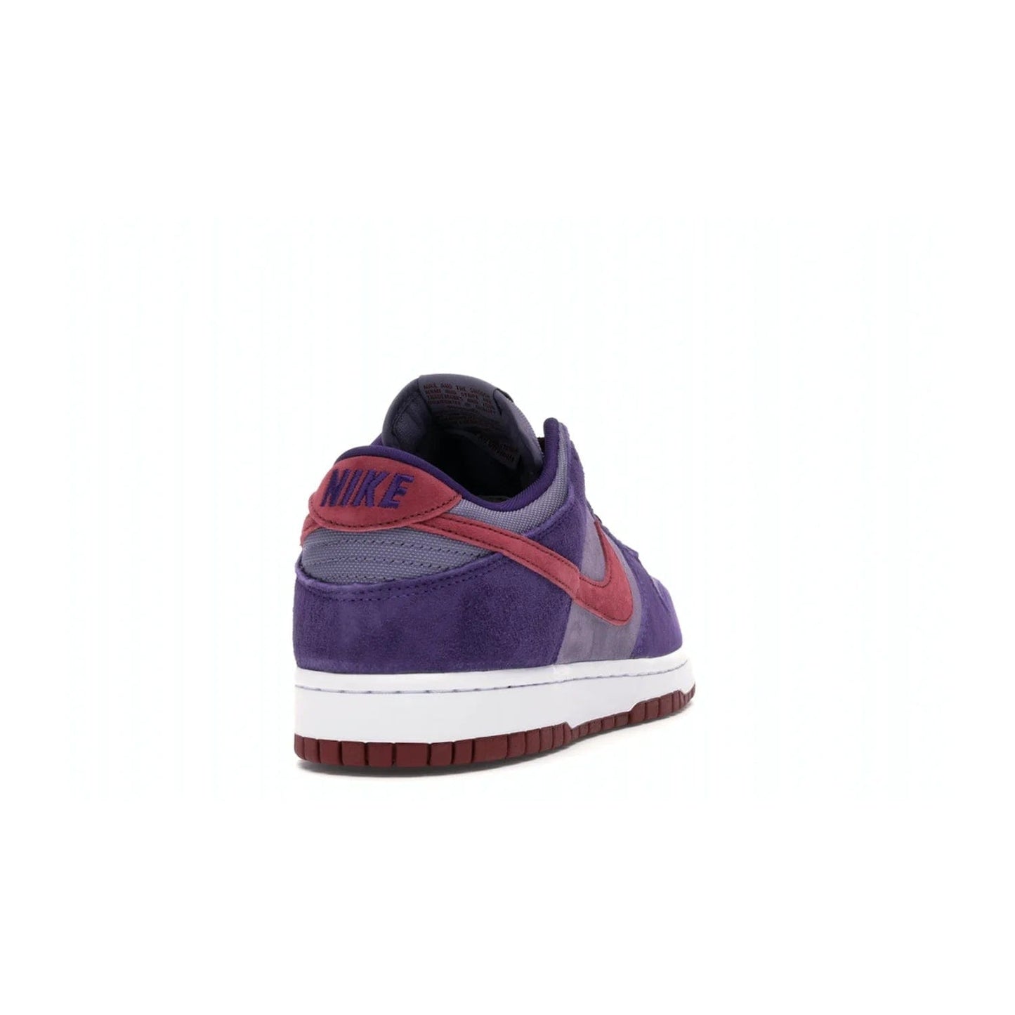 Nike Dunk Low Plum (2020) - Image 30 - Only at www.BallersClubKickz.com - Elevate your look with the Nike Dunk Low Plum (2020). Featuring a bold purple colorway, this retro-inspired silhouette is constructed of premium suede and makes for a must-have for any sneakerhead.