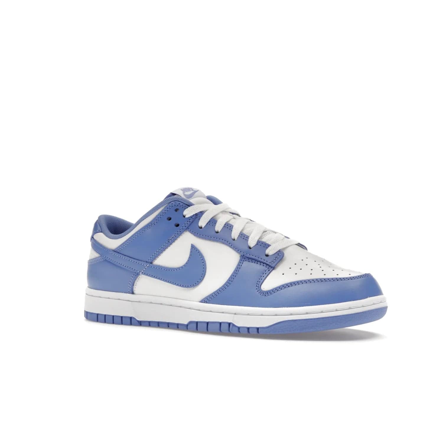 Nike Dunk Low Polar Blue - Image 4 - Only at www.BallersClubKickz.com - The Nike Dunk Low in Polar Blue combines streetwear and basketball style with leather uppers and white and Polar Blue overlays. Features include a rubber outsole, Nike Swoosh, white branding, and a padded tongue. Perfect for sports, casual, or everyday wear. On sale October 14th, 2023.