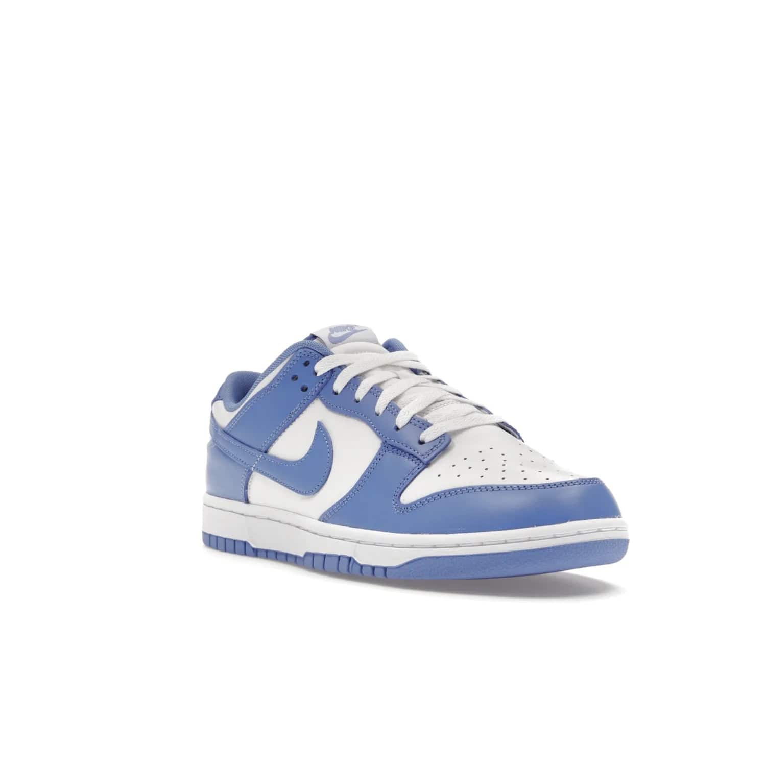 Nike Dunk Low Polar Blue - Image 6 - Only at www.BallersClubKickz.com - The Nike Dunk Low in Polar Blue combines streetwear and basketball style with leather uppers and white and Polar Blue overlays. Features include a rubber outsole, Nike Swoosh, white branding, and a padded tongue. Perfect for sports, casual, or everyday wear. On sale October 14th, 2023.