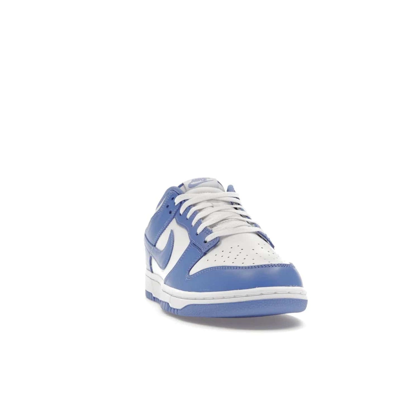 Nike Dunk Low Polar Blue - Image 8 - Only at www.BallersClubKickz.com - The Nike Dunk Low in Polar Blue combines streetwear and basketball style with leather uppers and white and Polar Blue overlays. Features include a rubber outsole, Nike Swoosh, white branding, and a padded tongue. Perfect for sports, casual, or everyday wear. On sale October 14th, 2023.