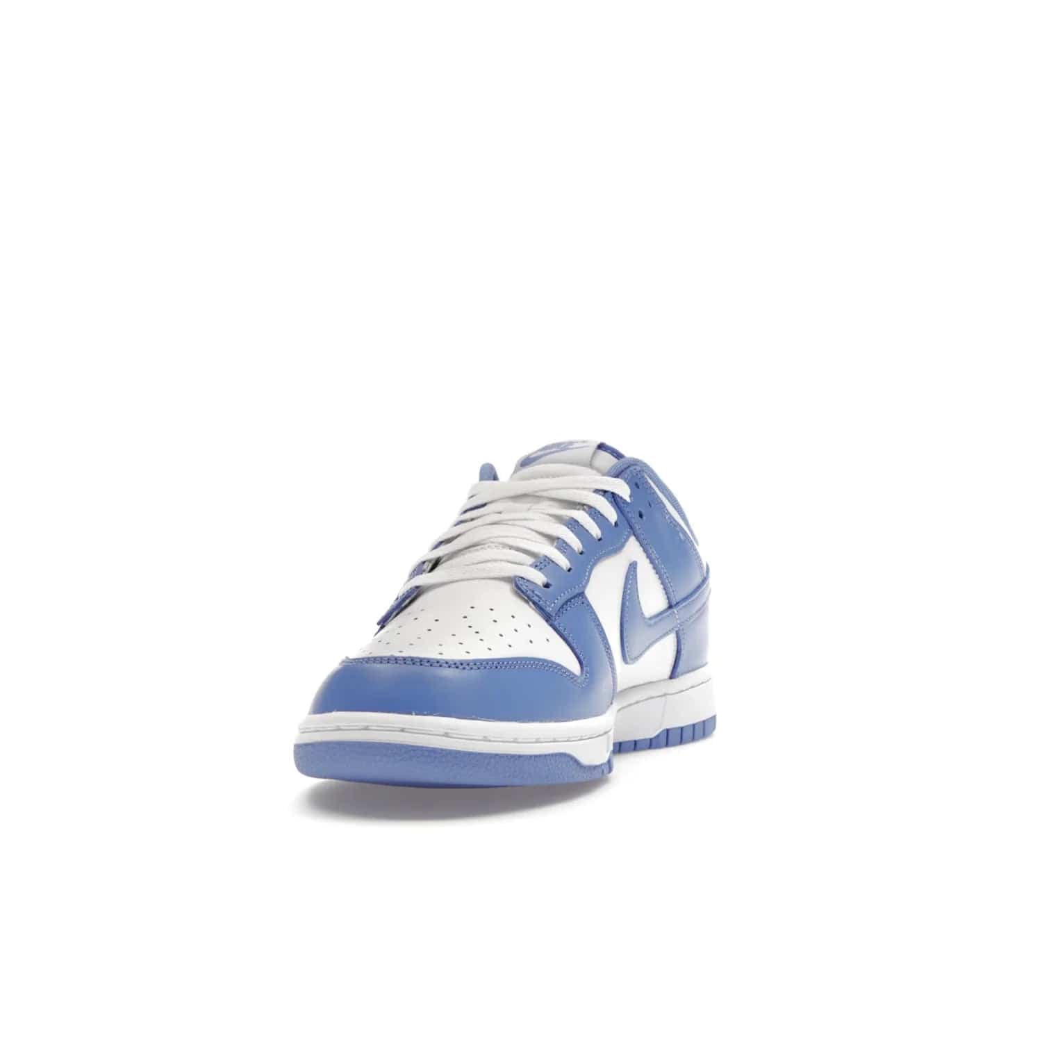 Nike Dunk Low Polar Blue - Image 12 - Only at www.BallersClubKickz.com - The Nike Dunk Low in Polar Blue combines streetwear and basketball style with leather uppers and white and Polar Blue overlays. Features include a rubber outsole, Nike Swoosh, white branding, and a padded tongue. Perfect for sports, casual, or everyday wear. On sale October 14th, 2023.