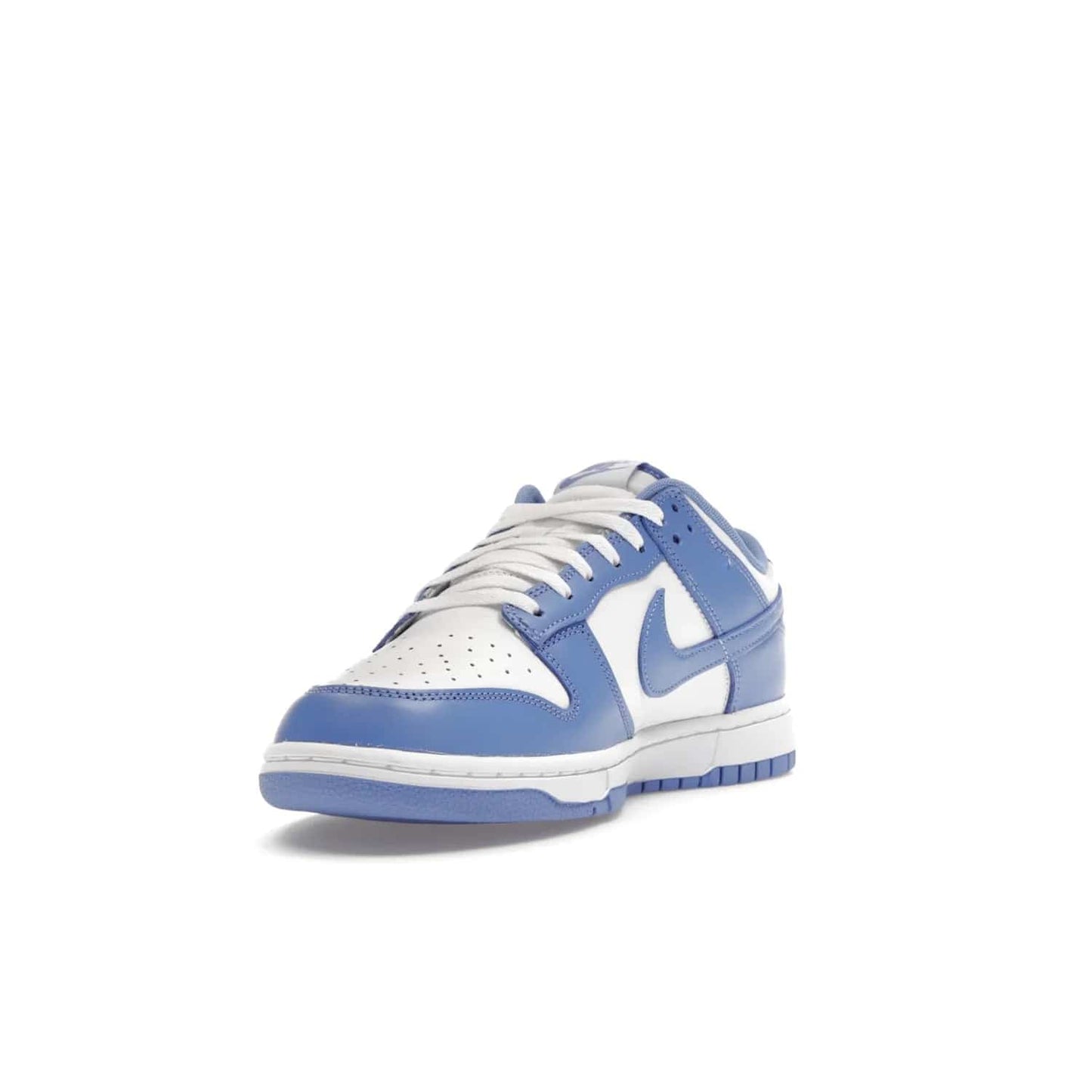 Nike Dunk Low Polar Blue - Image 13 - Only at www.BallersClubKickz.com - The Nike Dunk Low in Polar Blue combines streetwear and basketball style with leather uppers and white and Polar Blue overlays. Features include a rubber outsole, Nike Swoosh, white branding, and a padded tongue. Perfect for sports, casual, or everyday wear. On sale October 14th, 2023.