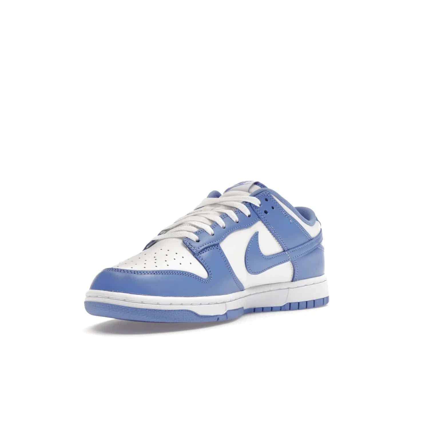Nike Dunk Low Polar Blue - Image 14 - Only at www.BallersClubKickz.com - The Nike Dunk Low in Polar Blue combines streetwear and basketball style with leather uppers and white and Polar Blue overlays. Features include a rubber outsole, Nike Swoosh, white branding, and a padded tongue. Perfect for sports, casual, or everyday wear. On sale October 14th, 2023.