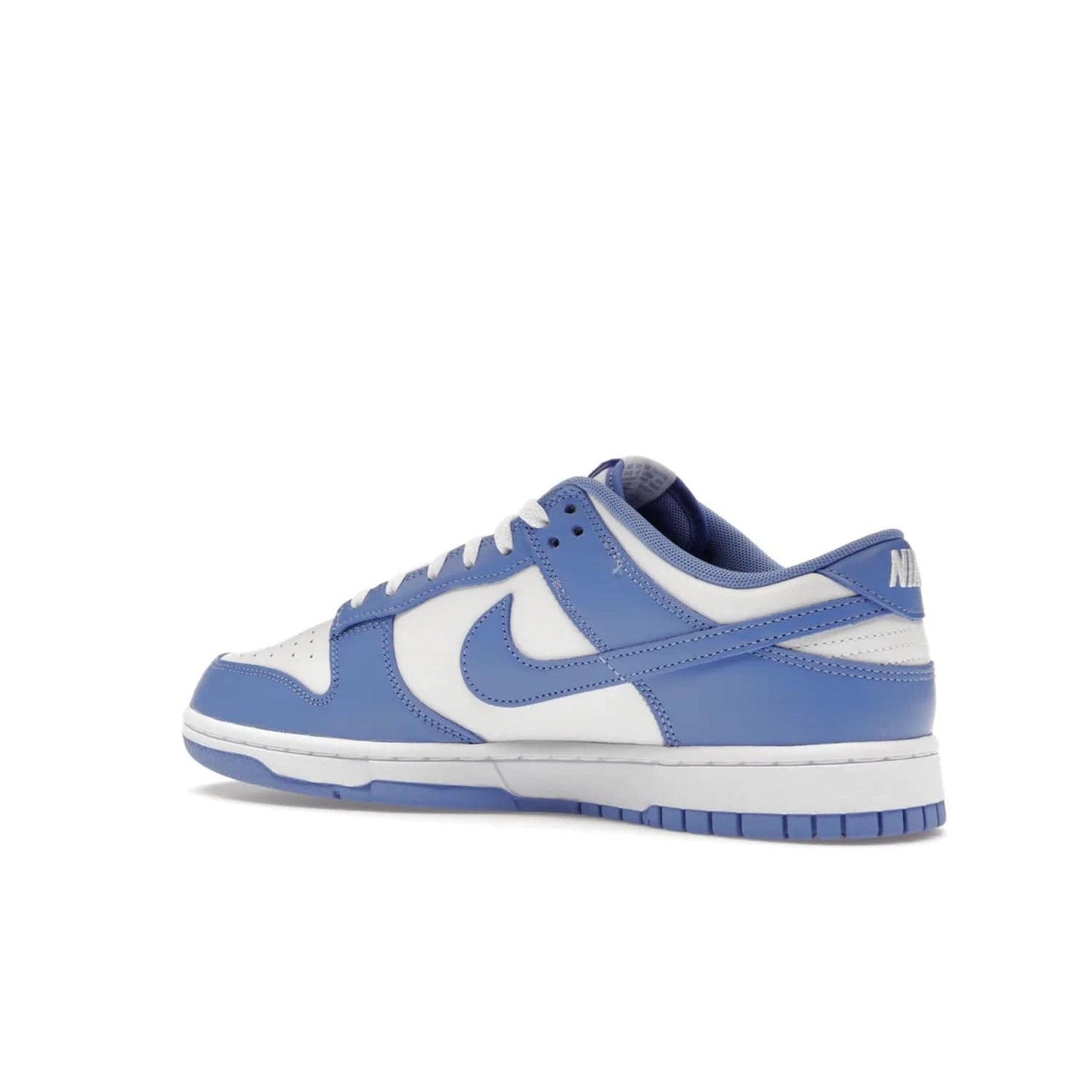 Nike Dunk Low Polar Blue - Image 22 - Only at www.BallersClubKickz.com - The Nike Dunk Low in Polar Blue combines streetwear and basketball style with leather uppers and white and Polar Blue overlays. Features include a rubber outsole, Nike Swoosh, white branding, and a padded tongue. Perfect for sports, casual, or everyday wear. On sale October 14th, 2023.