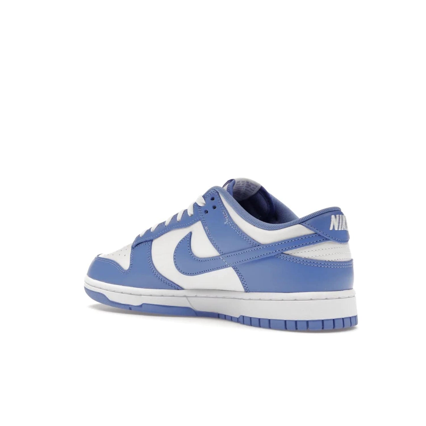 Nike Dunk Low Polar Blue - Image 23 - Only at www.BallersClubKickz.com - The Nike Dunk Low in Polar Blue combines streetwear and basketball style with leather uppers and white and Polar Blue overlays. Features include a rubber outsole, Nike Swoosh, white branding, and a padded tongue. Perfect for sports, casual, or everyday wear. On sale October 14th, 2023.