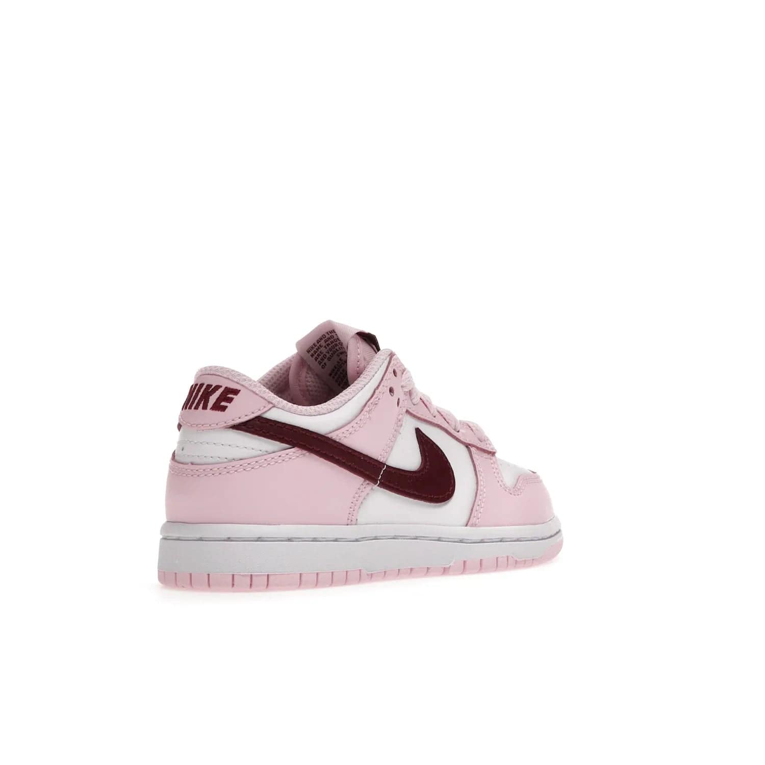 Nike Dunk Low Pink Red White (PS) - Image 32 - Only at www.BallersClubKickz.com - Introducing the Nike Dunk Low Pink Red White (PS), the perfect addition to your sneaker collection. A classic silhouette with modern vibrant colors, including a pink upper with red and white accents and a white midsole. Comfort and durability, perfect for any outfit. Limited edition, available June 22nd.