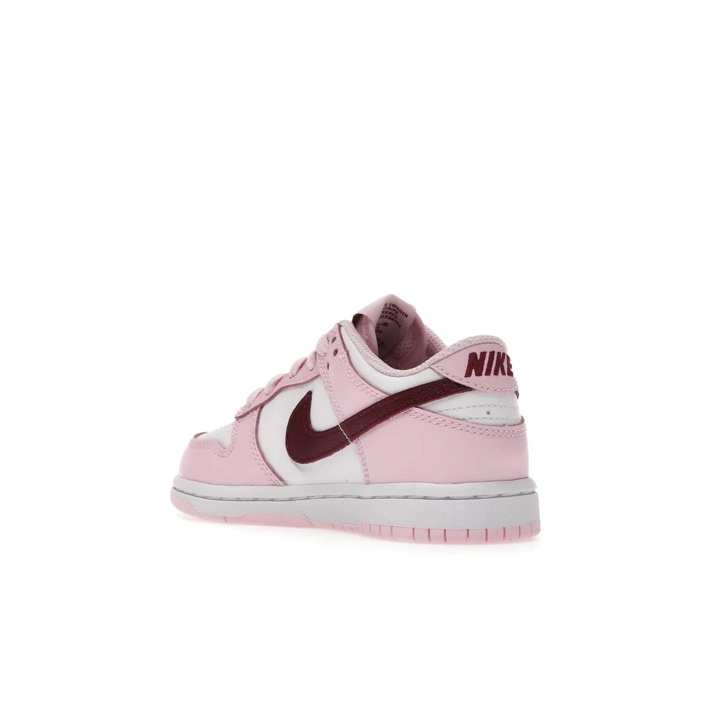 Nike Dunk Low Pink Red White (PS) - Image 24 - Only at www.BallersClubKickz.com - Introducing the Nike Dunk Low Pink Red White (PS), the perfect addition to your sneaker collection. A classic silhouette with modern vibrant colors, including a pink upper with red and white accents and a white midsole. Comfort and durability, perfect for any outfit. Limited edition, available June 22nd.