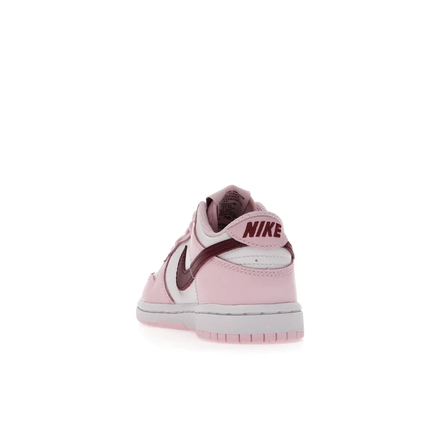Nike Dunk Low Pink Red White (PS) - Image 26 - Only at www.BallersClubKickz.com - Introducing the Nike Dunk Low Pink Red White (PS), the perfect addition to your sneaker collection. A classic silhouette with modern vibrant colors, including a pink upper with red and white accents and a white midsole. Comfort and durability, perfect for any outfit. Limited edition, available June 22nd.
