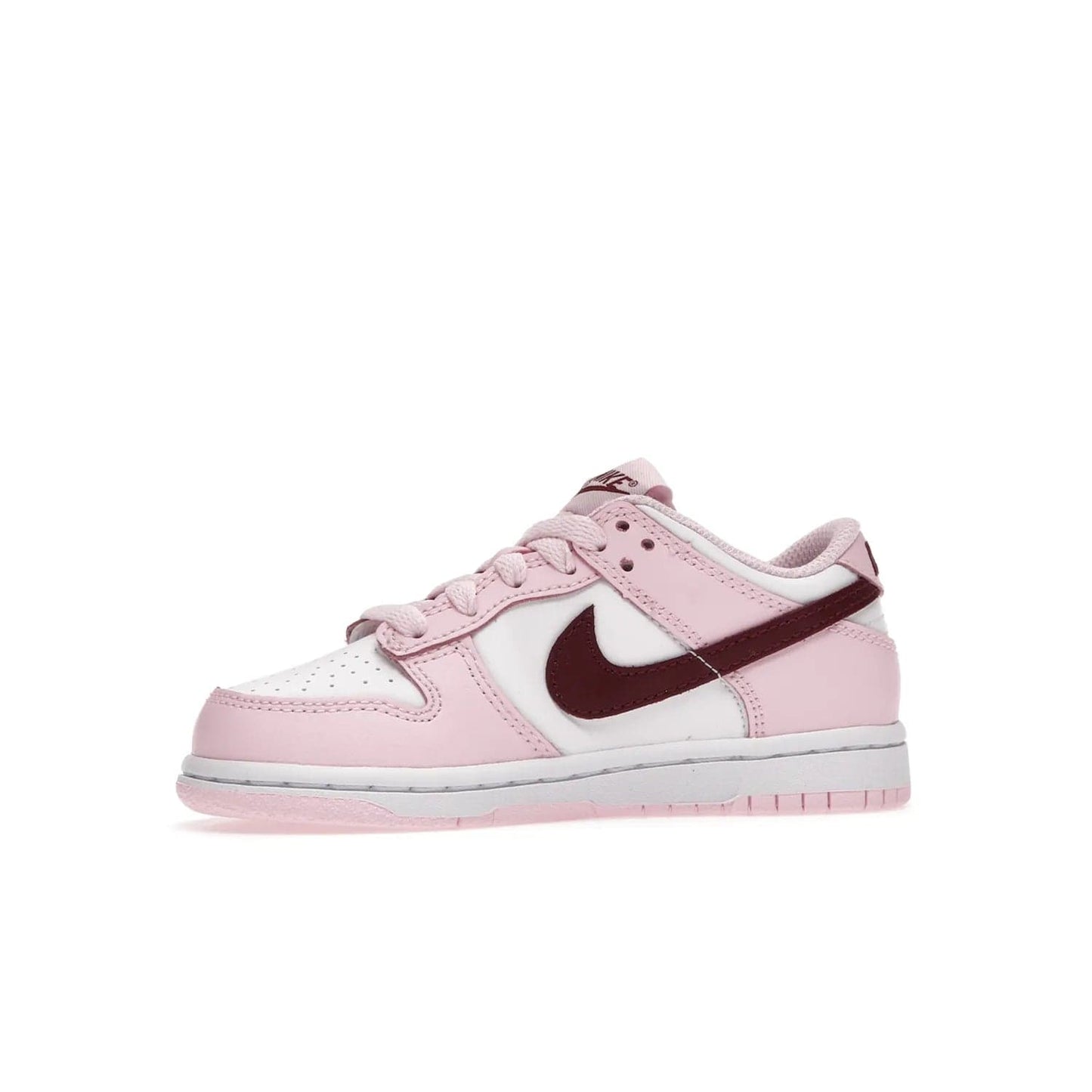 Nike Dunk Low Pink Red White (PS) - Image 17 - Only at www.BallersClubKickz.com - Introducing the Nike Dunk Low Pink Red White (PS), the perfect addition to your sneaker collection. A classic silhouette with modern vibrant colors, including a pink upper with red and white accents and a white midsole. Comfort and durability, perfect for any outfit. Limited edition, available June 22nd.