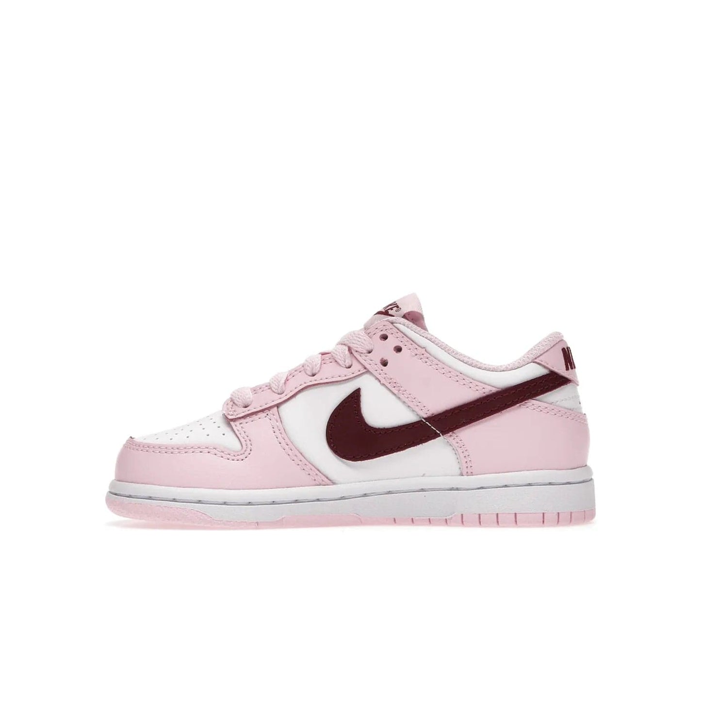 Nike Dunk Low Pink Red White (PS) - Image 19 - Only at www.BallersClubKickz.com - Introducing the Nike Dunk Low Pink Red White (PS), the perfect addition to your sneaker collection. A classic silhouette with modern vibrant colors, including a pink upper with red and white accents and a white midsole. Comfort and durability, perfect for any outfit. Limited edition, available June 22nd.