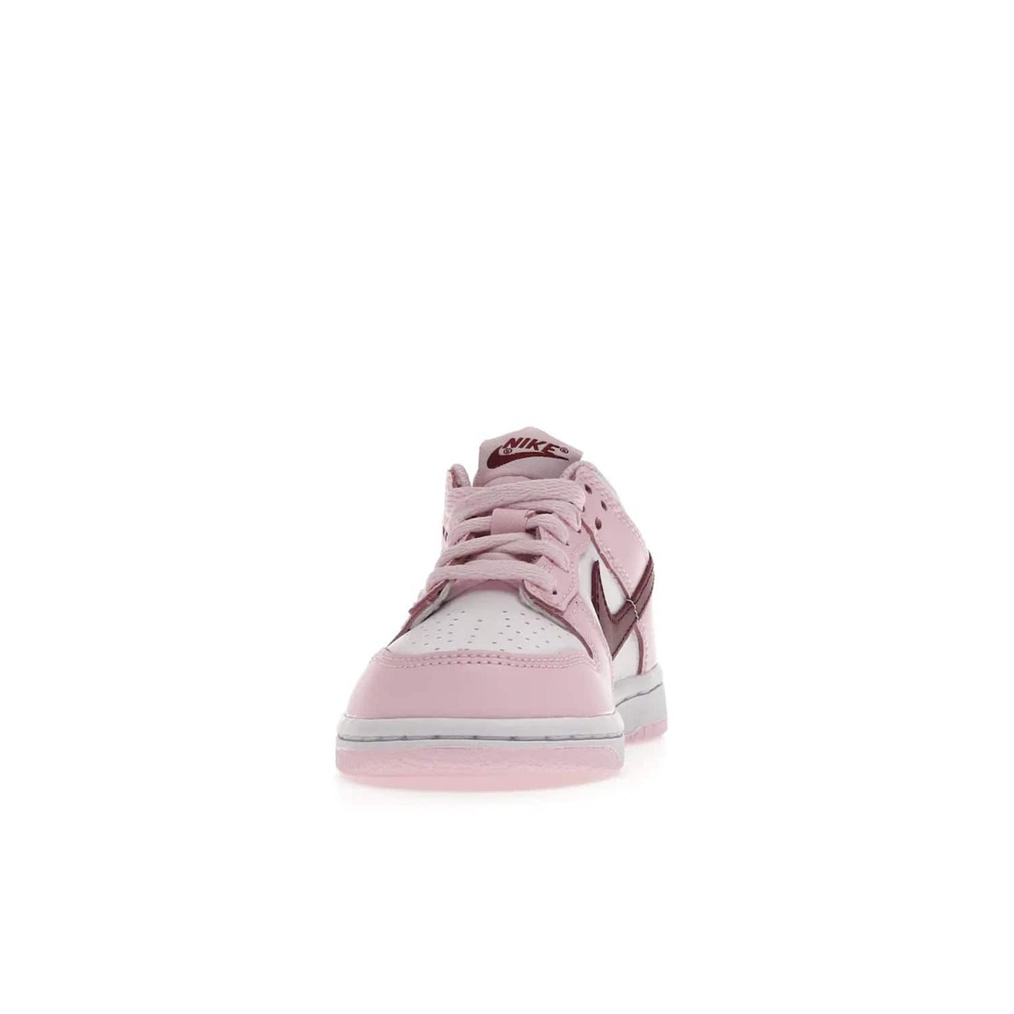 Nike Dunk Low Pink Red White (PS) - Image 11 - Only at www.BallersClubKickz.com - Introducing the Nike Dunk Low Pink Red White (PS), the perfect addition to your sneaker collection. A classic silhouette with modern vibrant colors, including a pink upper with red and white accents and a white midsole. Comfort and durability, perfect for any outfit. Limited edition, available June 22nd.