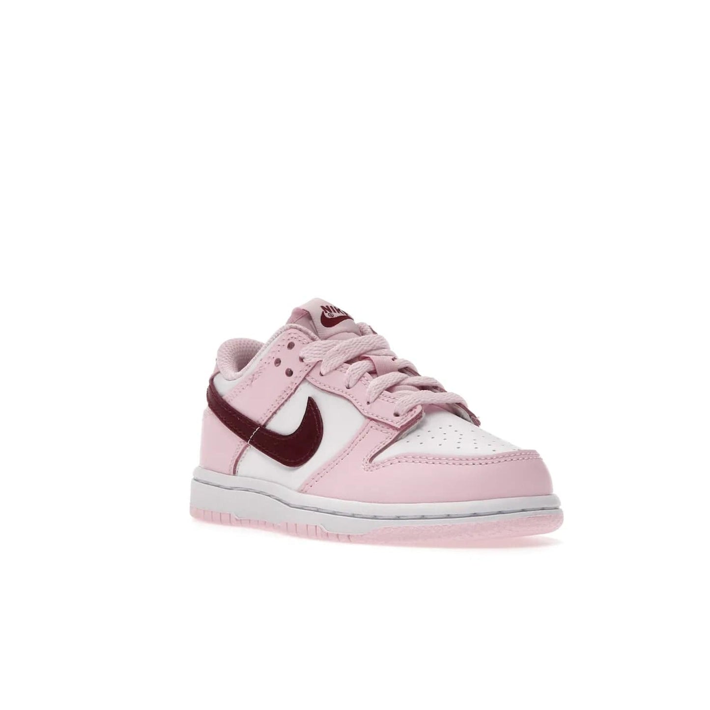 Nike Dunk Low Pink Red White (PS) - Image 6 - Only at www.BallersClubKickz.com - Introducing the Nike Dunk Low Pink Red White (PS), the perfect addition to your sneaker collection. A classic silhouette with modern vibrant colors, including a pink upper with red and white accents and a white midsole. Comfort and durability, perfect for any outfit. Limited edition, available June 22nd.