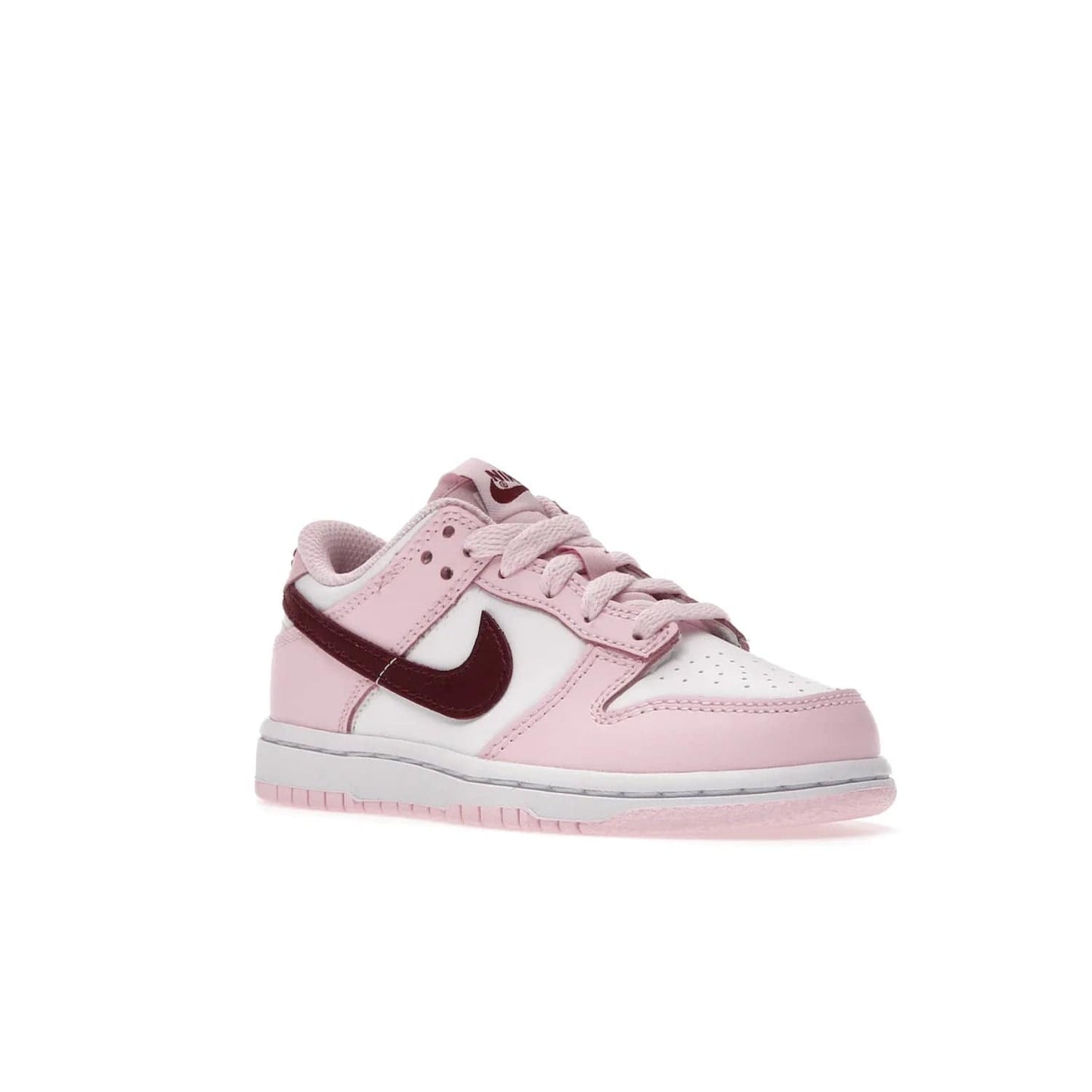 Nike Dunk Low Pink Red White (PS) - Image 5 - Only at www.BallersClubKickz.com - Introducing the Nike Dunk Low Pink Red White (PS), the perfect addition to your sneaker collection. A classic silhouette with modern vibrant colors, including a pink upper with red and white accents and a white midsole. Comfort and durability, perfect for any outfit. Limited edition, available June 22nd.
