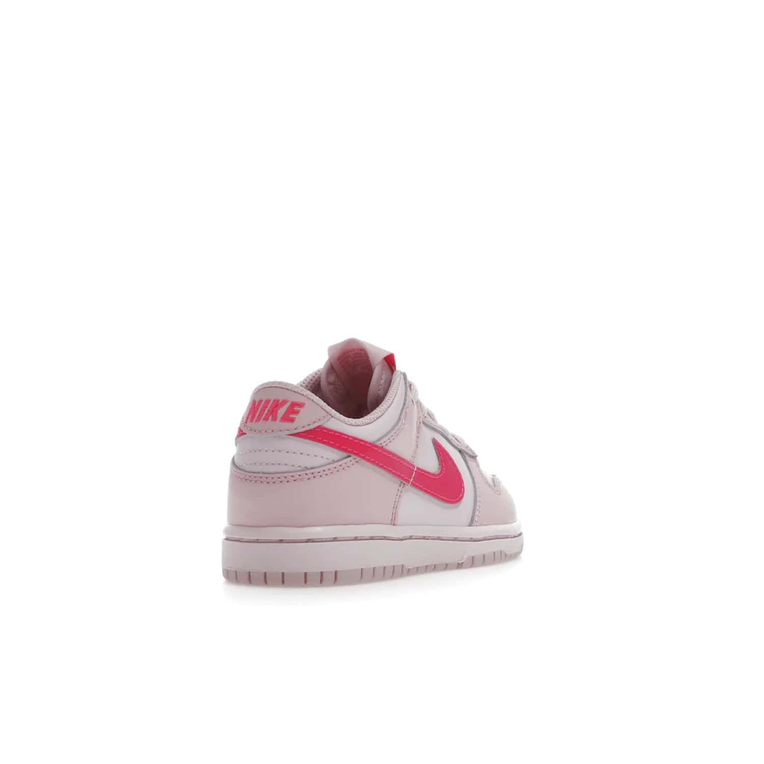 Nike Dunk Low Triple Pink (PS) - Image 31 - Only at www.BallersClubKickz.com - A stunning shoe option for completing any look: Nike Dunk Low Triple Pink (Preschool). Light pink layered leather upper with darker pink synthetic accents. Plus toe box of perforated pink leather and Nike symbol embroidered pull tab. Rubber midsole and outsole. Affordable price of $85.
