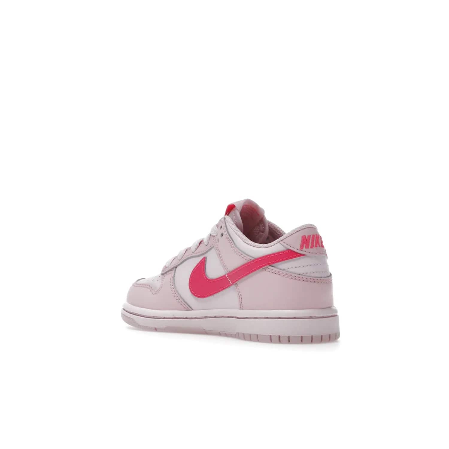 Nike Dunk Low Triple Pink (PS) - Image 24 - Only at www.BallersClubKickz.com - A stunning shoe option for completing any look: Nike Dunk Low Triple Pink (Preschool). Light pink layered leather upper with darker pink synthetic accents. Plus toe box of perforated pink leather and Nike symbol embroidered pull tab. Rubber midsole and outsole. Affordable price of $85.