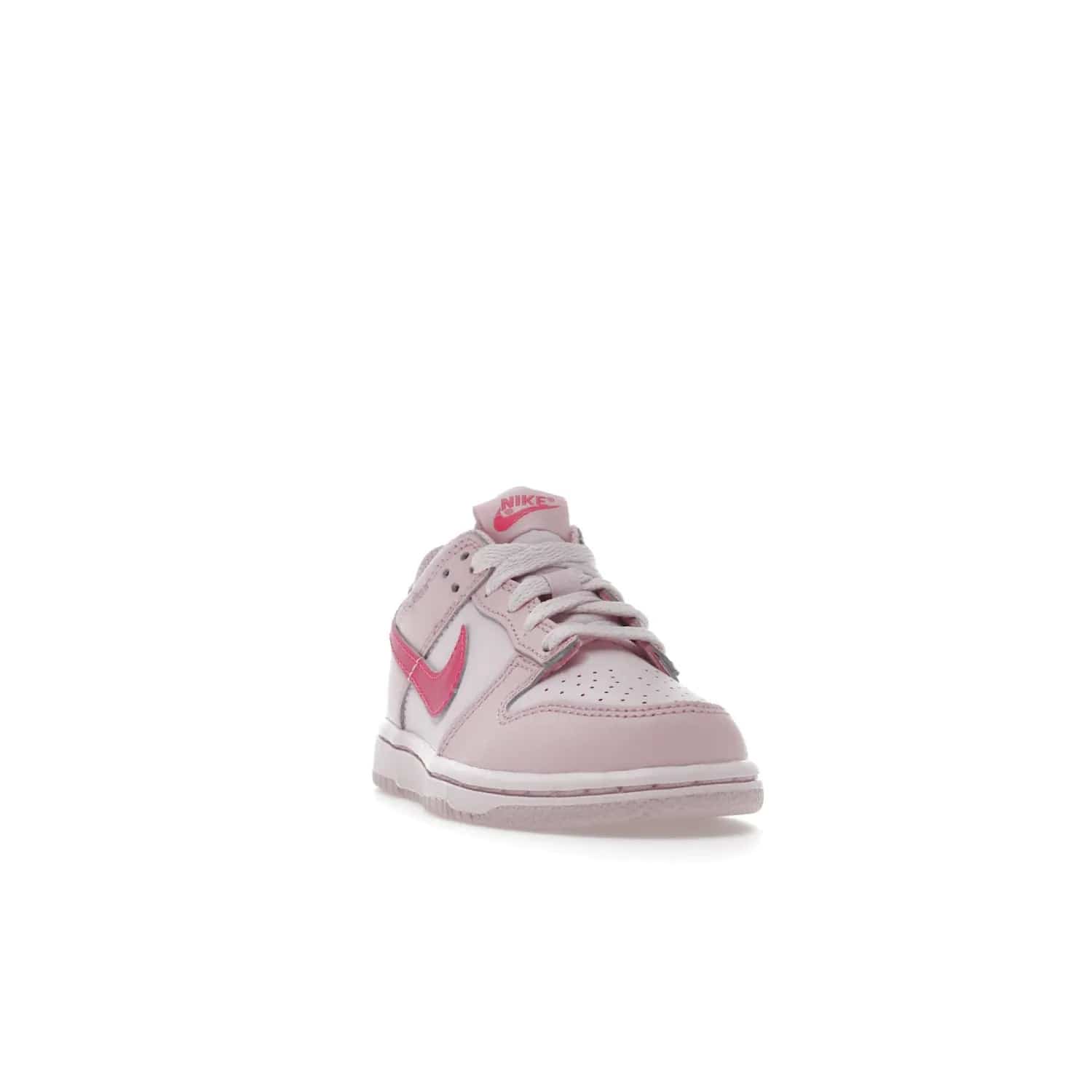 Nike Dunk Low Triple Pink (PS) - Image 8 - Only at www.BallersClubKickz.com - A stunning shoe option for completing any look: Nike Dunk Low Triple Pink (Preschool). Light pink layered leather upper with darker pink synthetic accents. Plus toe box of perforated pink leather and Nike symbol embroidered pull tab. Rubber midsole and outsole. Affordable price of $85.