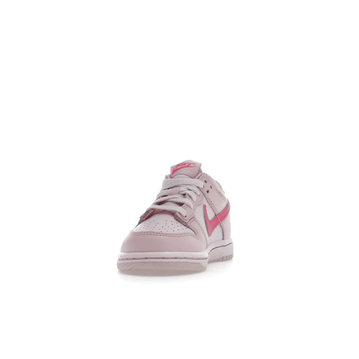 Nike Dunk Low Triple Pink (PS) - Image 12 - Only at www.BallersClubKickz.com - A stunning shoe option for completing any look: Nike Dunk Low Triple Pink (Preschool). Light pink layered leather upper with darker pink synthetic accents. Plus toe box of perforated pink leather and Nike symbol embroidered pull tab. Rubber midsole and outsole. Affordable price of $85.