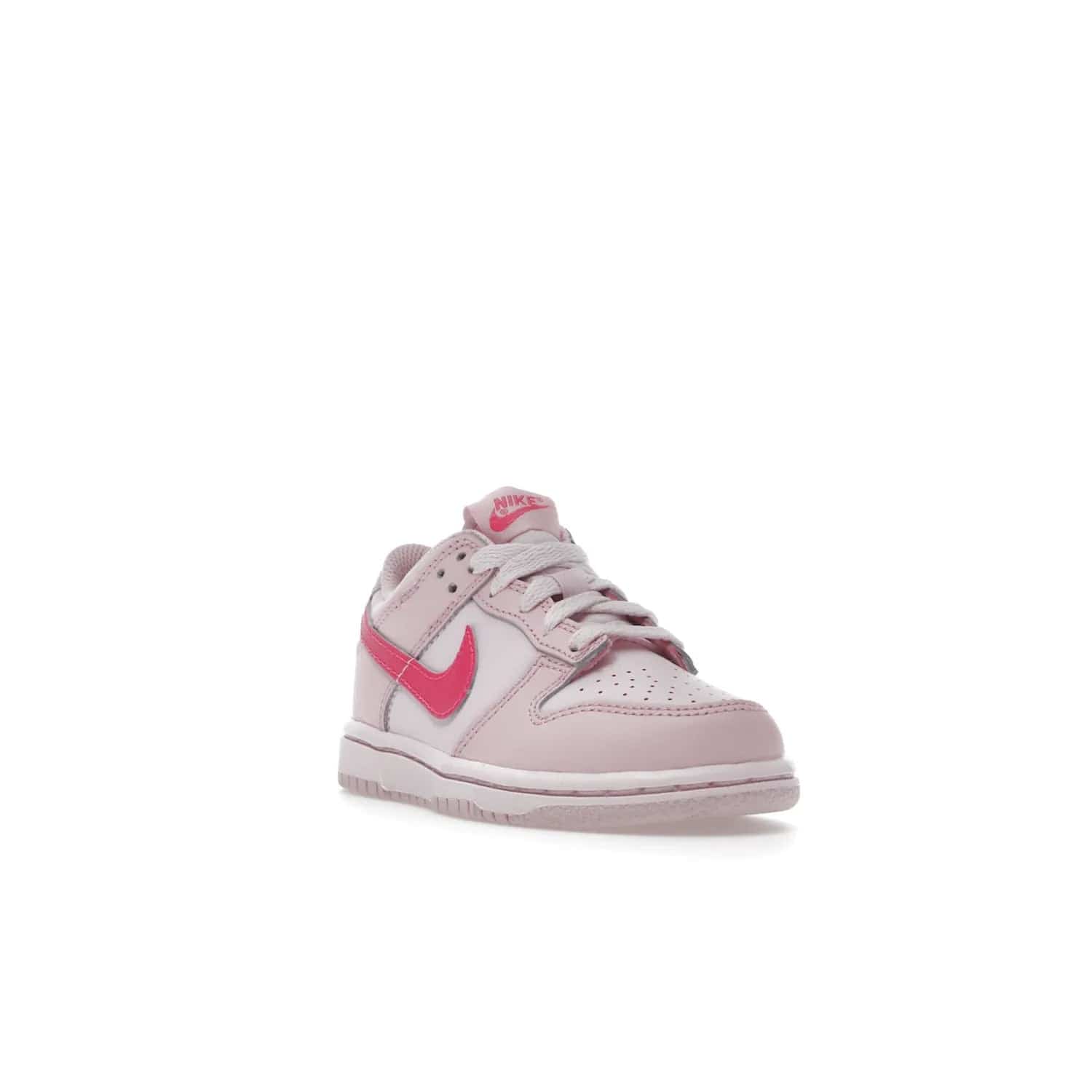 Nike Dunk Low Triple Pink (PS) - Image 7 - Only at www.BallersClubKickz.com - A stunning shoe option for completing any look: Nike Dunk Low Triple Pink (Preschool). Light pink layered leather upper with darker pink synthetic accents. Plus toe box of perforated pink leather and Nike symbol embroidered pull tab. Rubber midsole and outsole. Affordable price of $85.