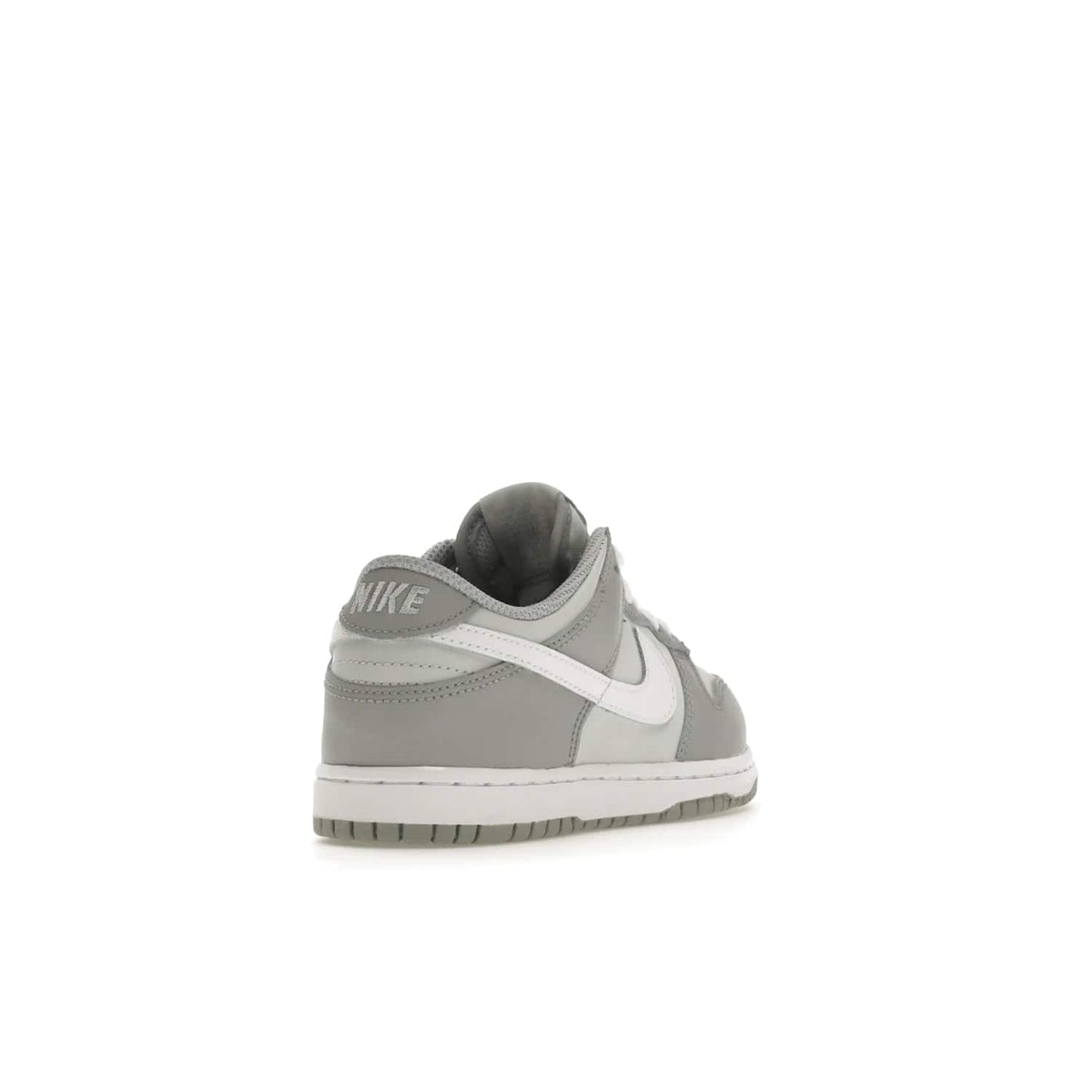 Nike Dunk Low Two-Toned Grey (PS) - Image 31 - Only at www.BallersClubKickz.com - Classic Nike style for your little one with the Nike Dunk Low Two-Toned Grey (Preschool). White laces, white tongue, white leather swoosh, grey sole & midsole, and patches of grey leather are timeless classics. Released March 2022 for comfort & style.