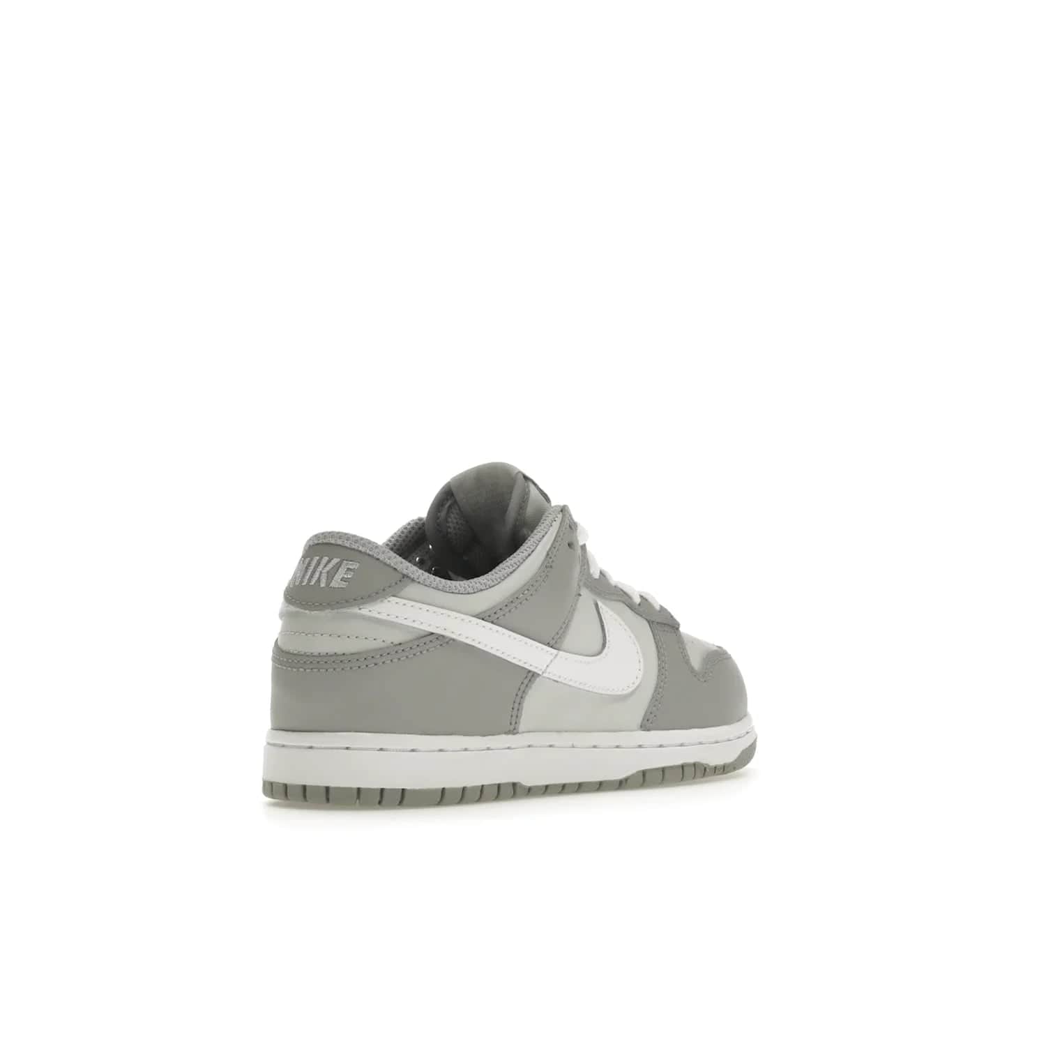 Nike Dunk Low Two-Toned Grey (PS) - Image 32 - Only at www.BallersClubKickz.com - Classic Nike style for your little one with the Nike Dunk Low Two-Toned Grey (Preschool). White laces, white tongue, white leather swoosh, grey sole & midsole, and patches of grey leather are timeless classics. Released March 2022 for comfort & style.