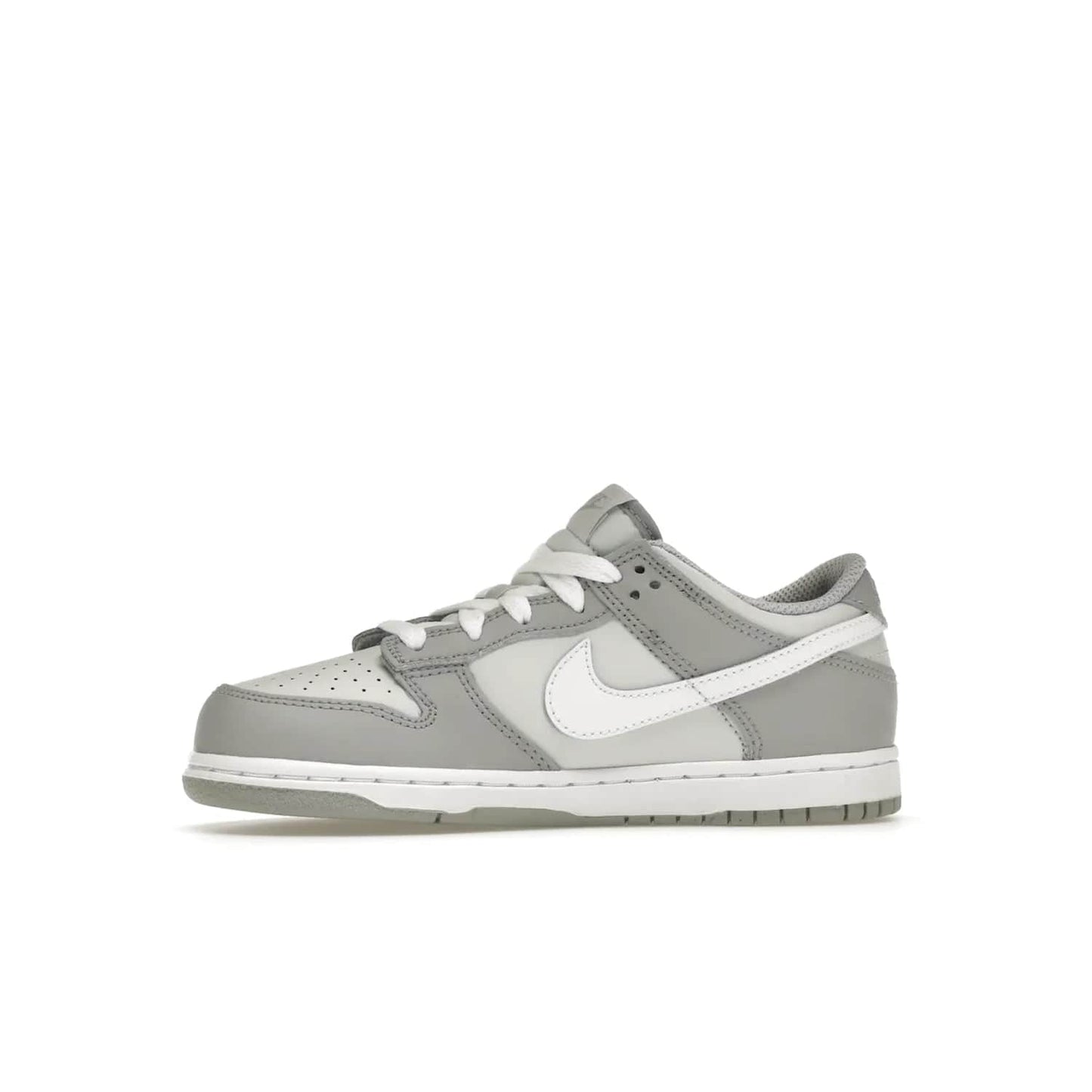 Nike Dunk Low Two-Toned Grey (PS) - Image 18 - Only at www.BallersClubKickz.com - Classic Nike style for your little one with the Nike Dunk Low Two-Toned Grey (Preschool). White laces, white tongue, white leather swoosh, grey sole & midsole, and patches of grey leather are timeless classics. Released March 2022 for comfort & style.
