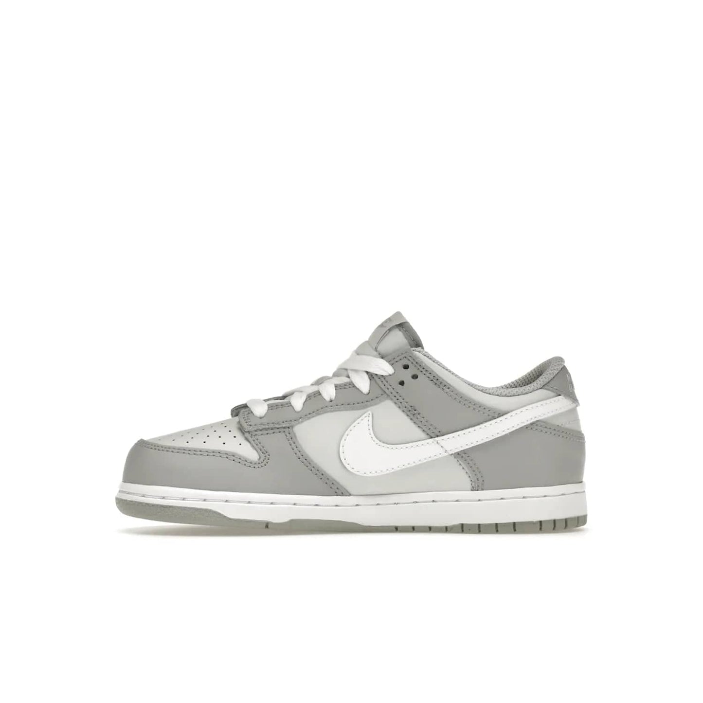 Nike Dunk Low Two-Toned Grey (PS) - Image 19 - Only at www.BallersClubKickz.com - Classic Nike style for your little one with the Nike Dunk Low Two-Toned Grey (Preschool). White laces, white tongue, white leather swoosh, grey sole & midsole, and patches of grey leather are timeless classics. Released March 2022 for comfort & style.