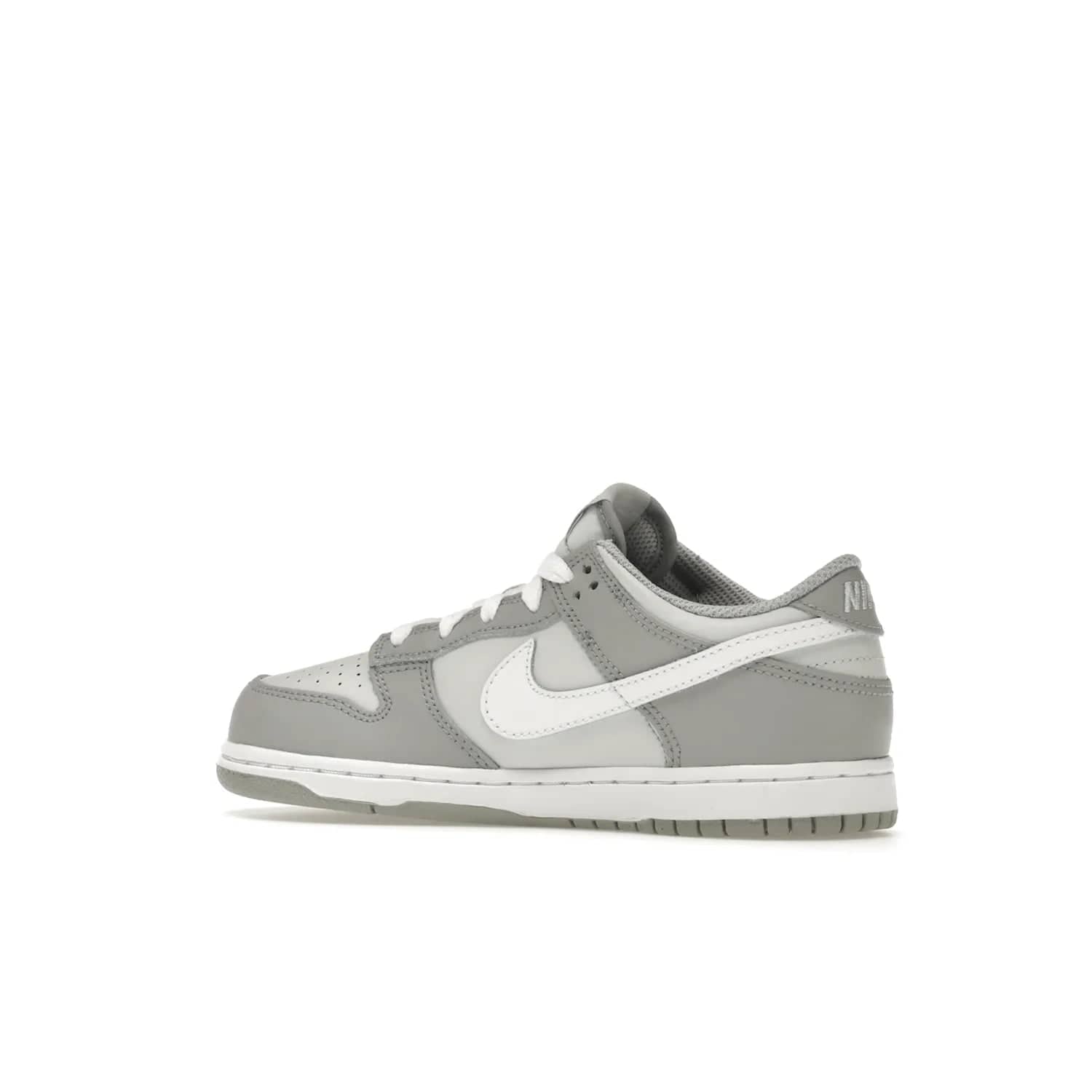 Nike Dunk Low Two-Toned Grey (PS) - Image 22 - Only at www.BallersClubKickz.com - Classic Nike style for your little one with the Nike Dunk Low Two-Toned Grey (Preschool). White laces, white tongue, white leather swoosh, grey sole & midsole, and patches of grey leather are timeless classics. Released March 2022 for comfort & style.