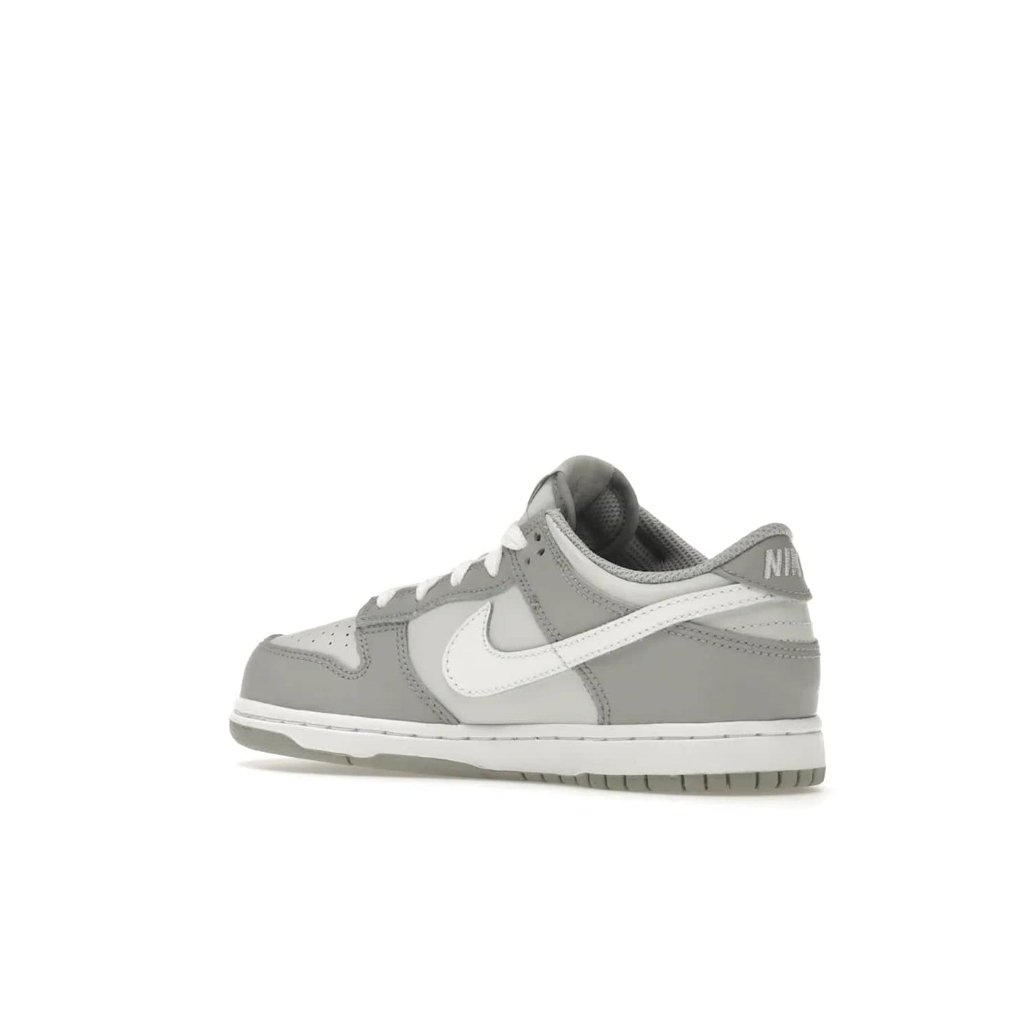 Nike Dunk Low Two-Toned Grey (PS) - Image 23 - Only at www.BallersClubKickz.com - Classic Nike style for your little one with the Nike Dunk Low Two-Toned Grey (Preschool). White laces, white tongue, white leather swoosh, grey sole & midsole, and patches of grey leather are timeless classics. Released March 2022 for comfort & style.