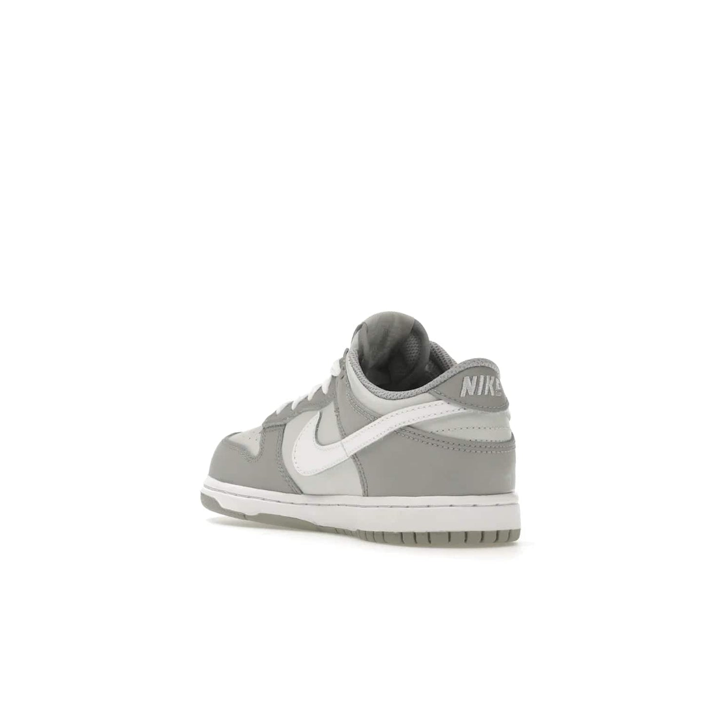 Nike Dunk Low Two-Toned Grey (PS) - Image 25 - Only at www.BallersClubKickz.com - Classic Nike style for your little one with the Nike Dunk Low Two-Toned Grey (Preschool). White laces, white tongue, white leather swoosh, grey sole & midsole, and patches of grey leather are timeless classics. Released March 2022 for comfort & style.