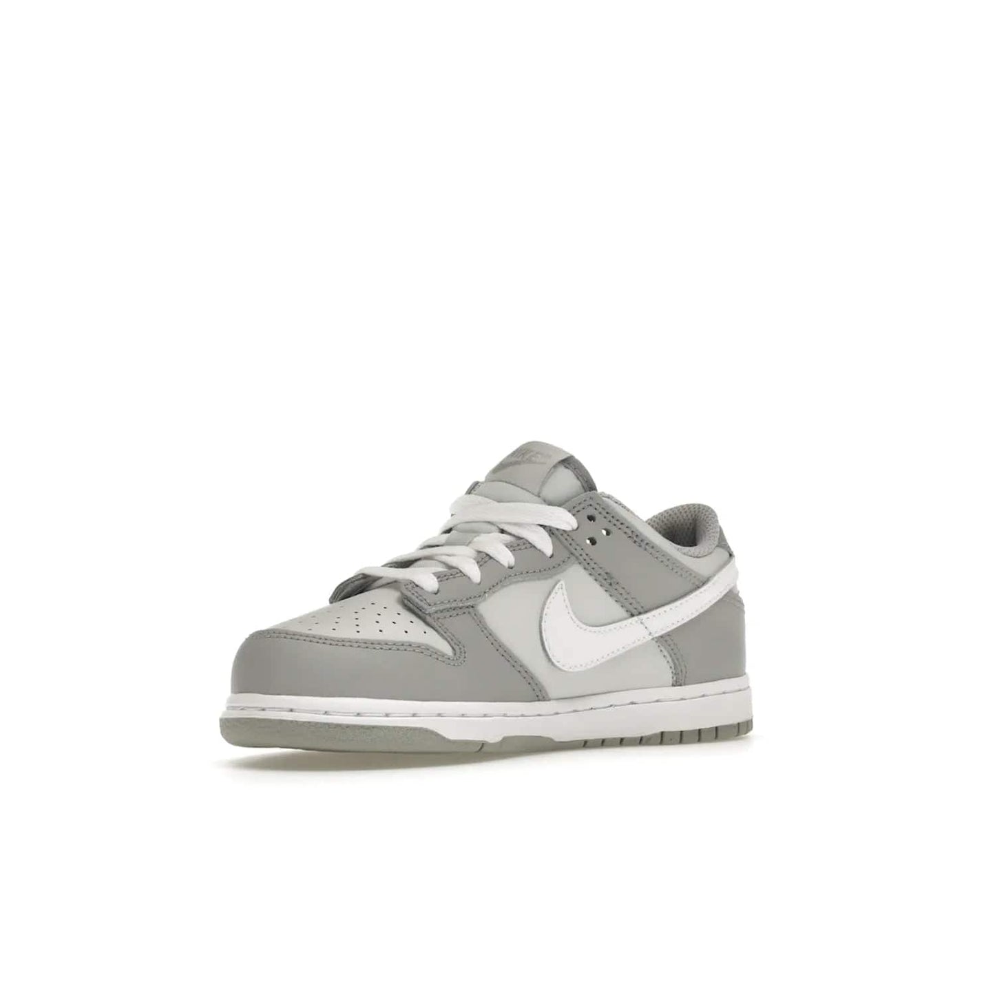 Nike Dunk Low Two-Toned Grey (PS) - Image 15 - Only at www.BallersClubKickz.com - Classic Nike style for your little one with the Nike Dunk Low Two-Toned Grey (Preschool). White laces, white tongue, white leather swoosh, grey sole & midsole, and patches of grey leather are timeless classics. Released March 2022 for comfort & style.