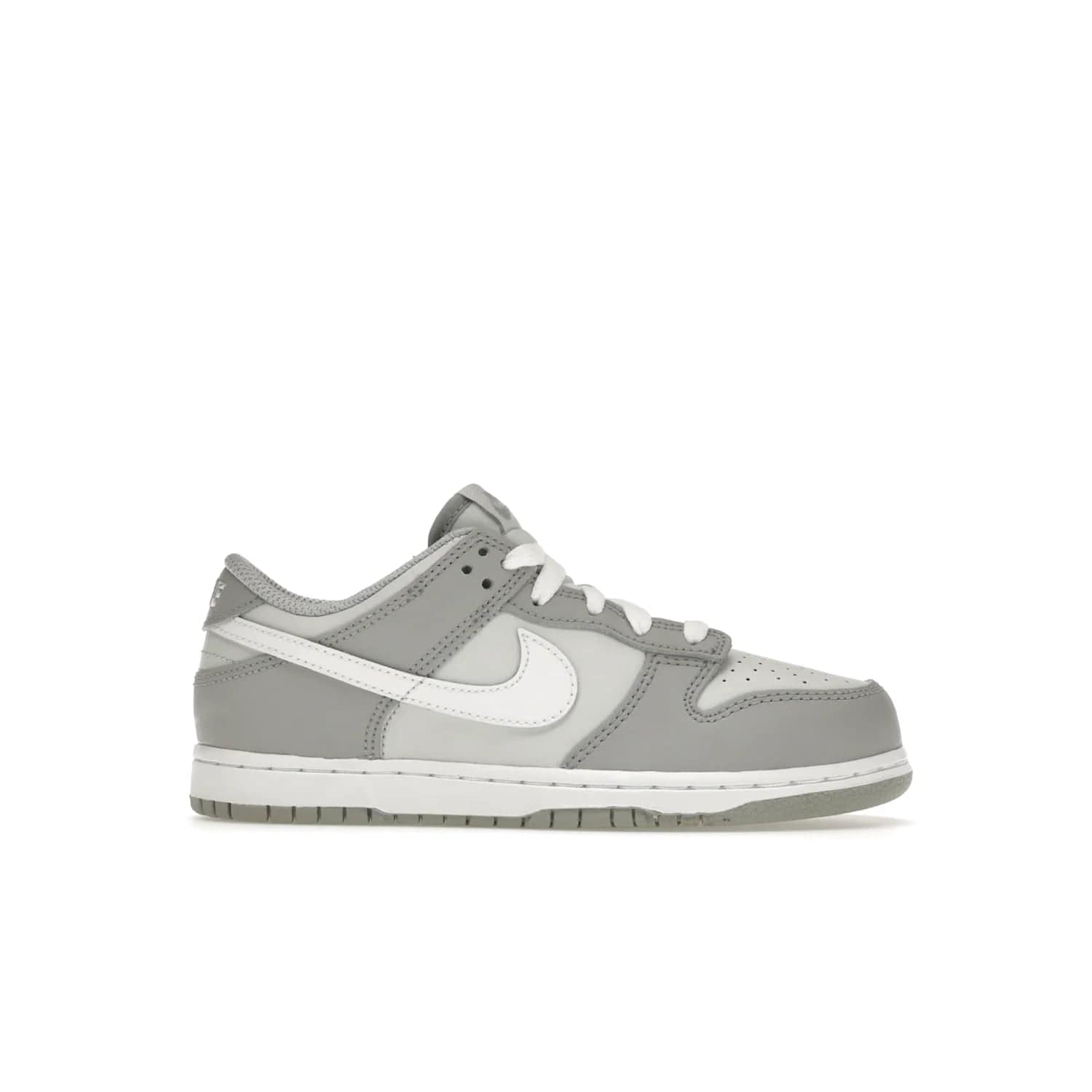Nike Dunk Low Two-Toned Grey (PS) - Image 2 - Only at www.BallersClubKickz.com - Classic Nike style for your little one with the Nike Dunk Low Two-Toned Grey (Preschool). White laces, white tongue, white leather swoosh, grey sole & midsole, and patches of grey leather are timeless classics. Released March 2022 for comfort & style.