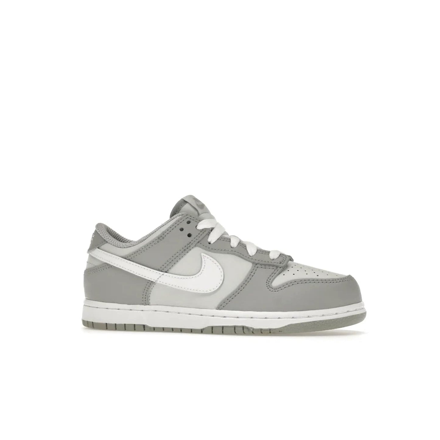 Nike Dunk Low Two-Toned Grey (PS) - Image 3 - Only at www.BallersClubKickz.com - Classic Nike style for your little one with the Nike Dunk Low Two-Toned Grey (Preschool). White laces, white tongue, white leather swoosh, grey sole & midsole, and patches of grey leather are timeless classics. Released March 2022 for comfort & style.